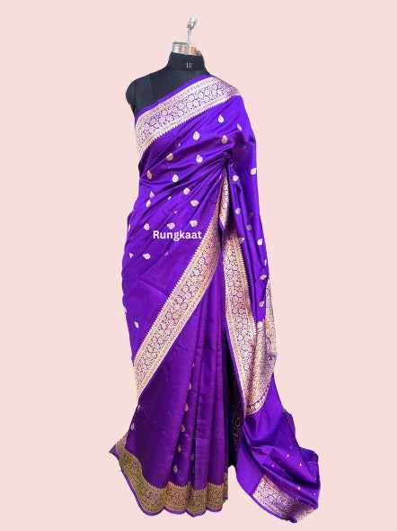 Purple silk saree with gold border and ornate pallu, all-over small motifs