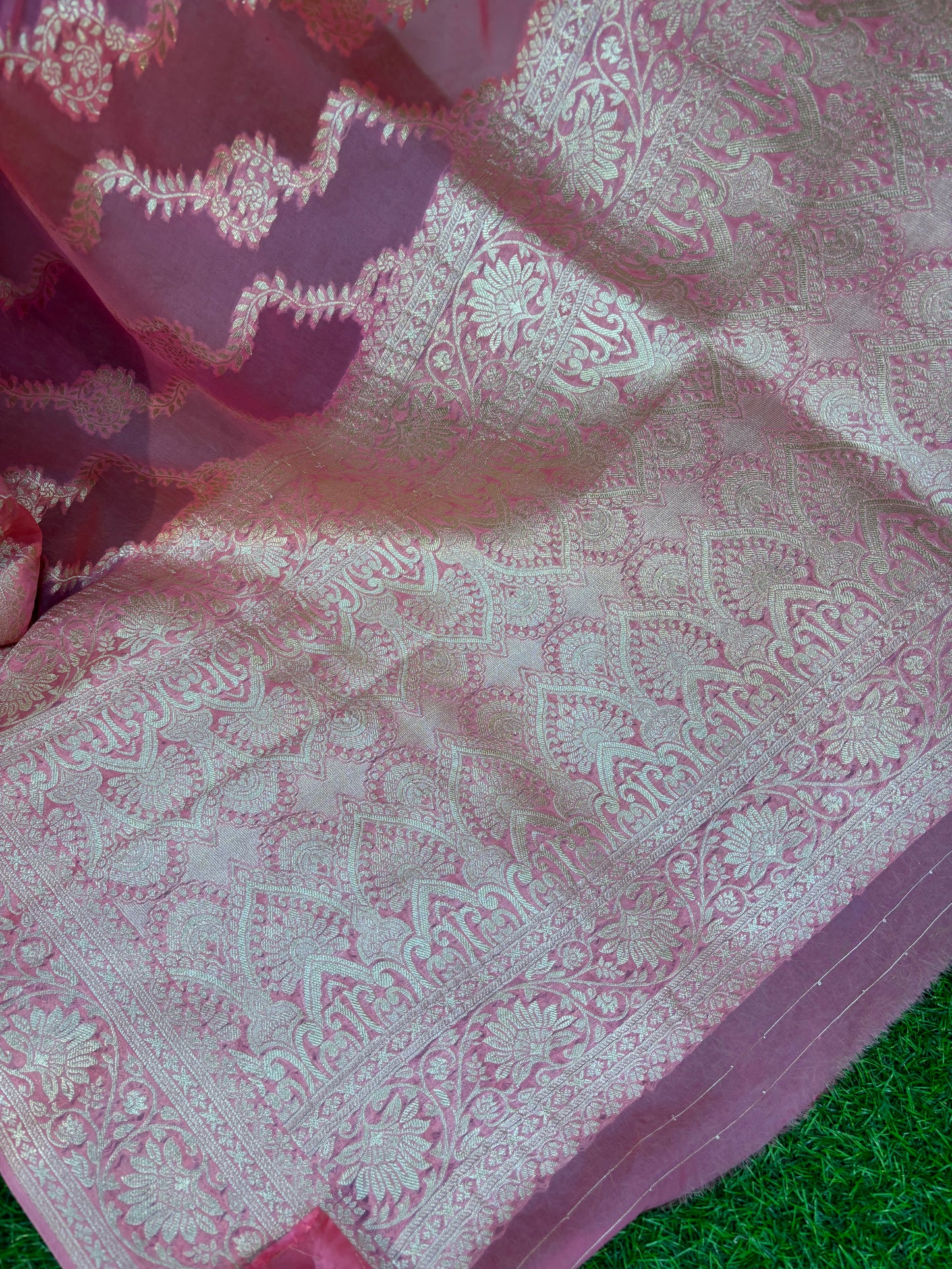 Pink Georgette Banarasi saree with silver zari paisley motifs and ornate border
