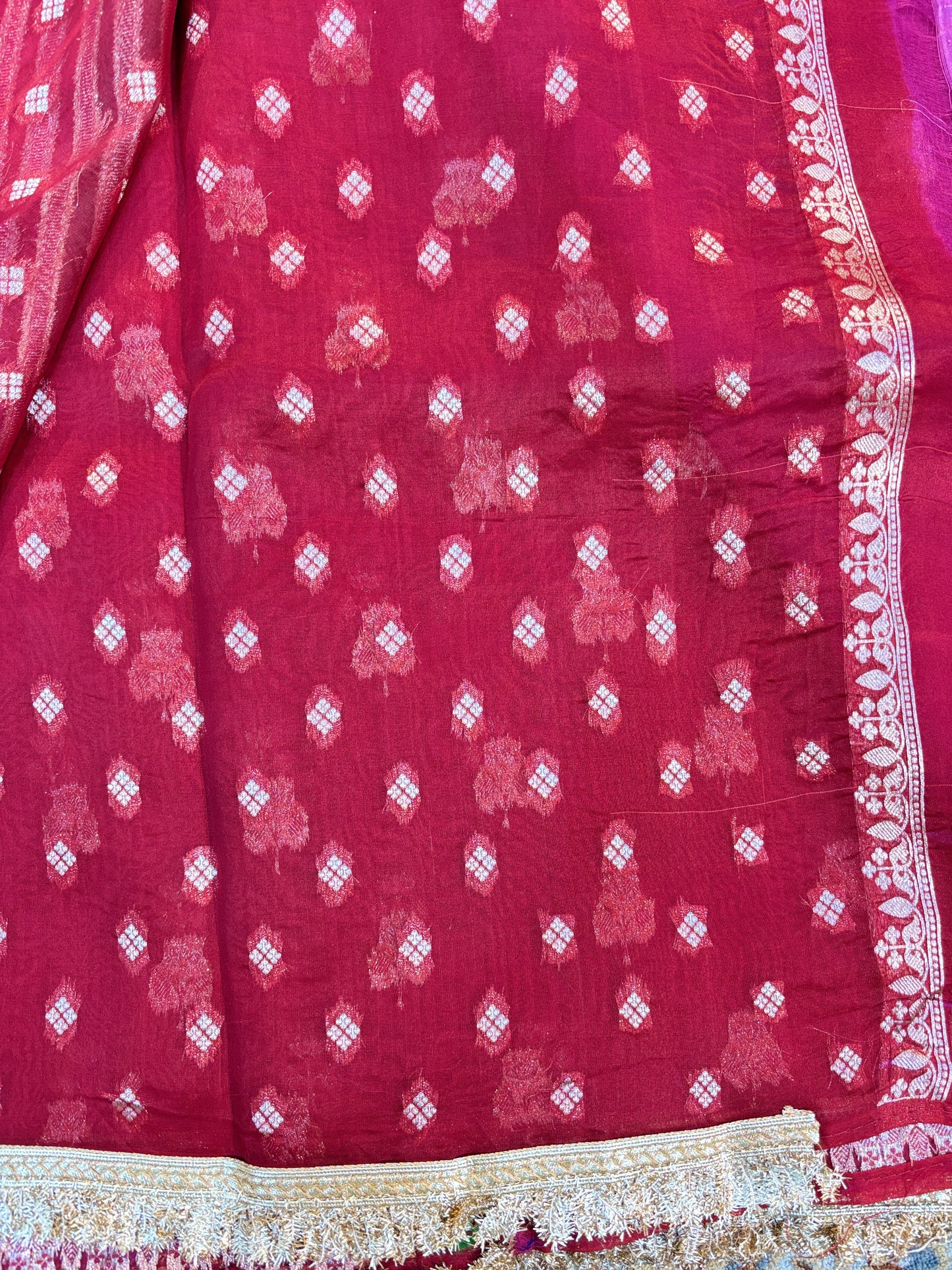 Fuchsia Banarasi handloom saree with white diamond motifs and gold patterned border