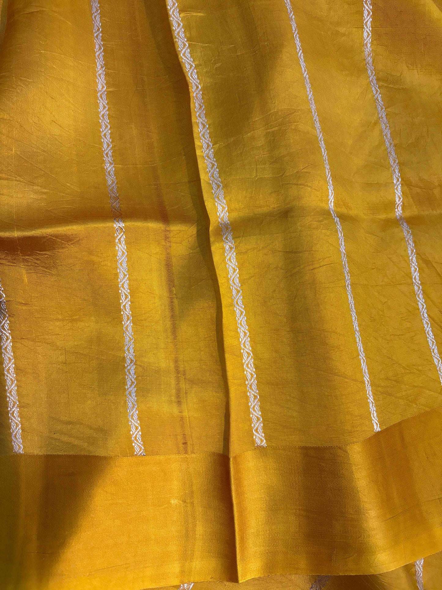 Mustard yellow handloom saree with vertical stitched stripe accents