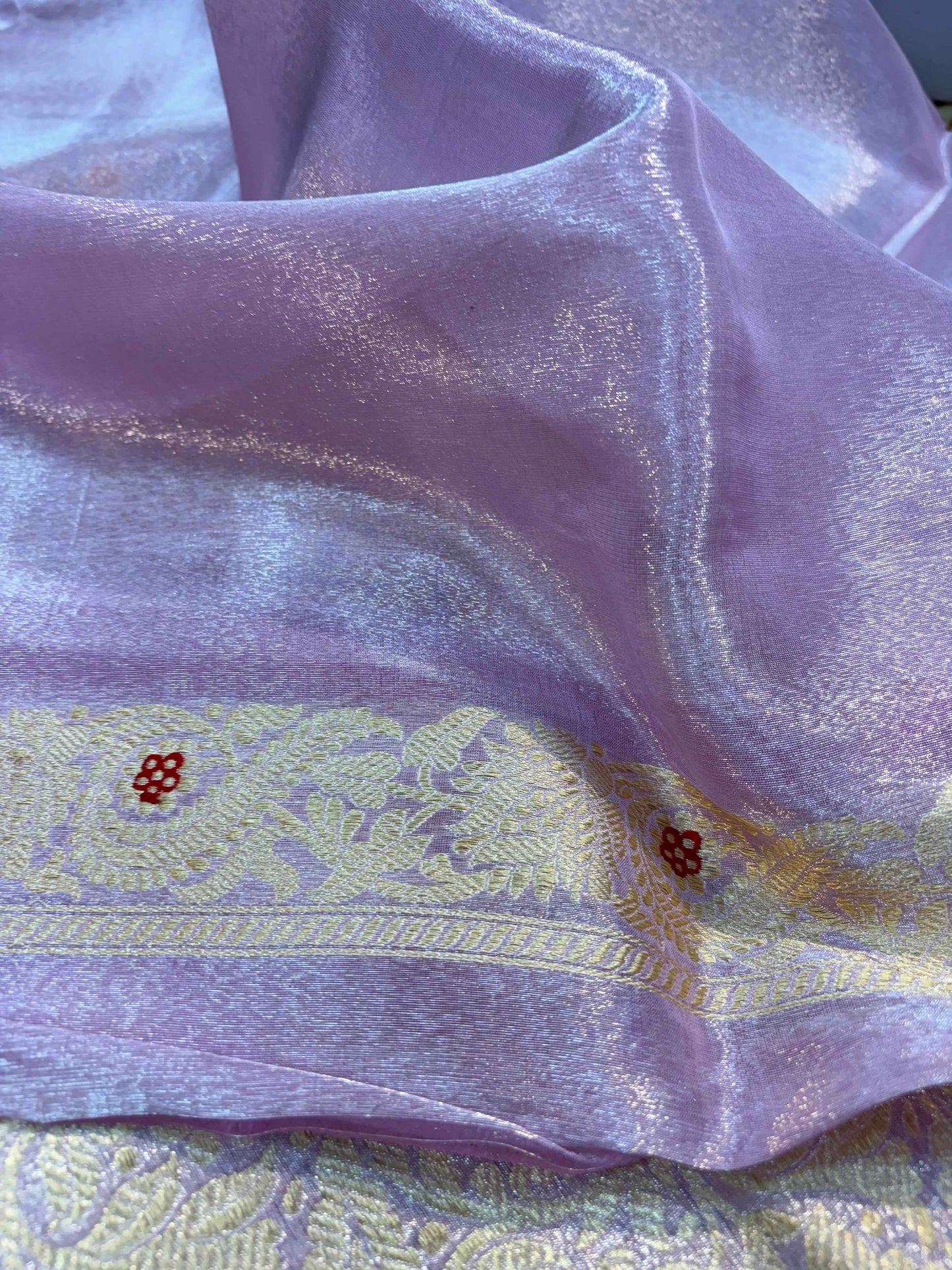 Levander katan tissue saree close-up in light purple with gold zari panel and motifs
