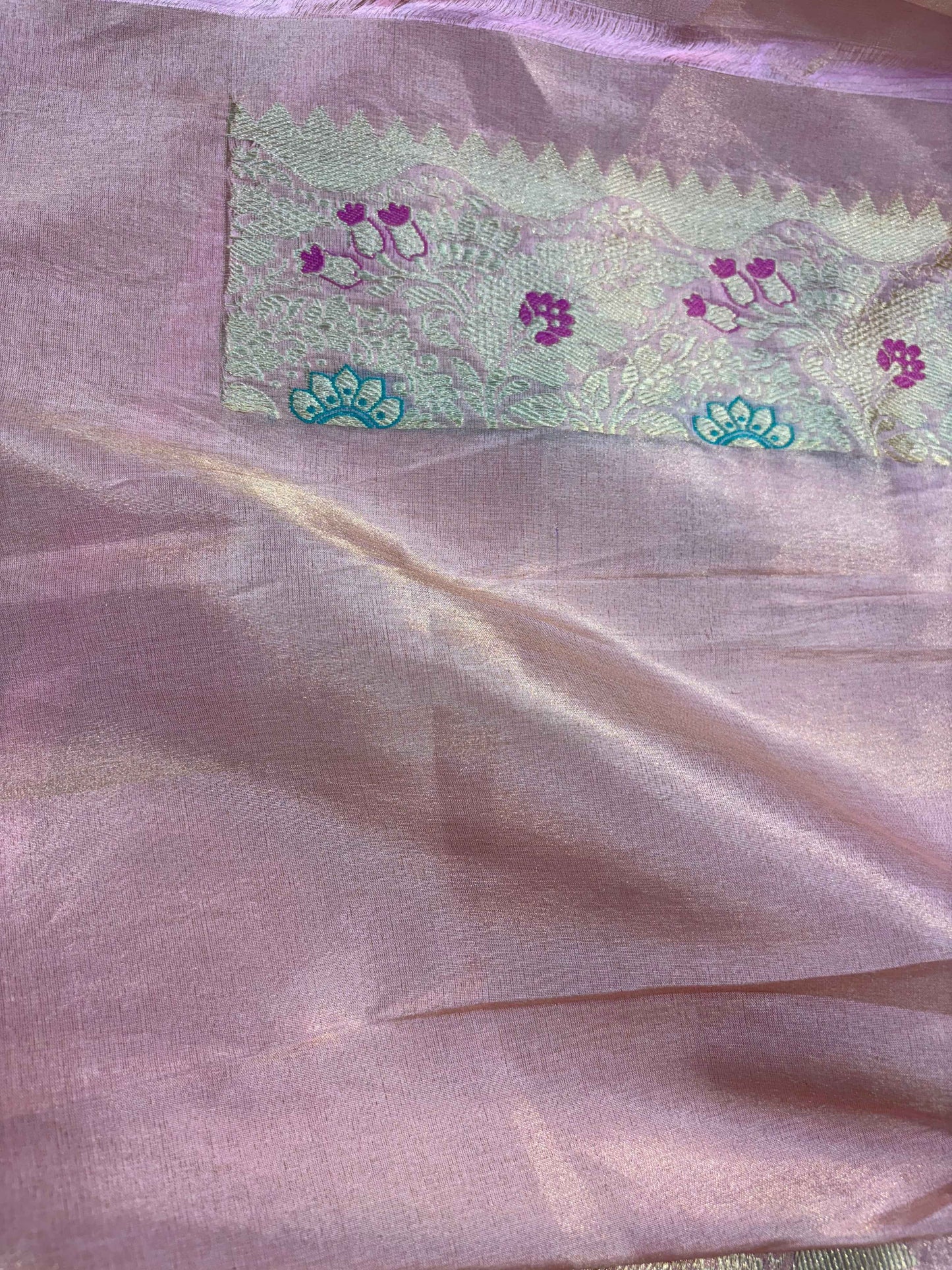 Lavender Katan tissue saree with cream decorative border strip and floral motifs