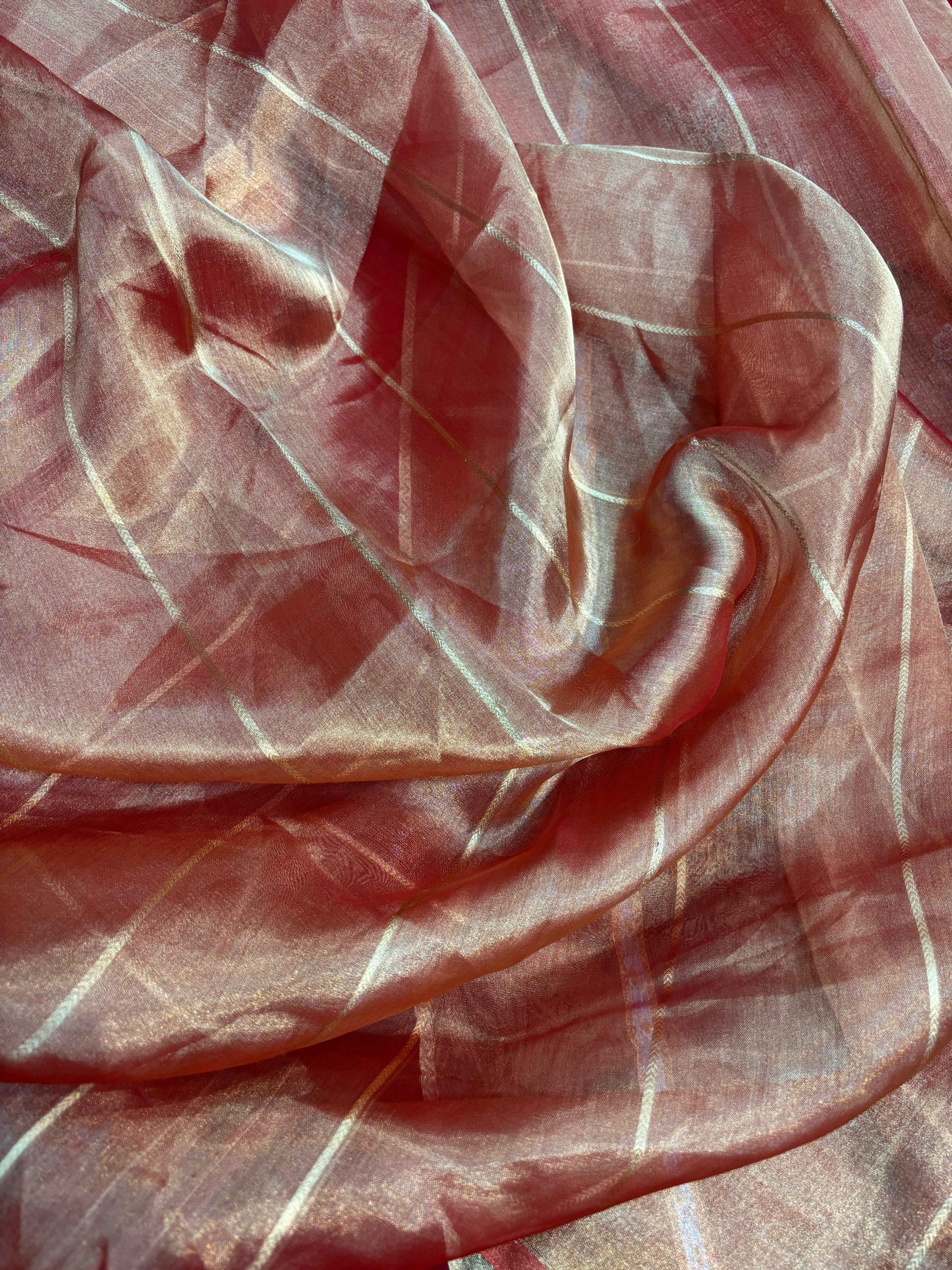Red-orange Banarasi tissue saree with fine checked pattern and gold threads