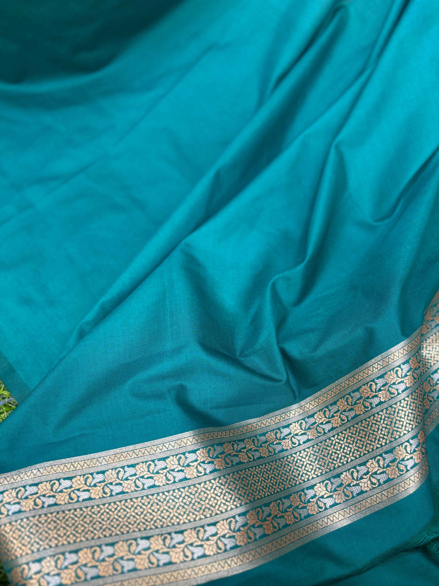 Sky blue Banarasi silk saree with silver woven border stripe and paisley accents