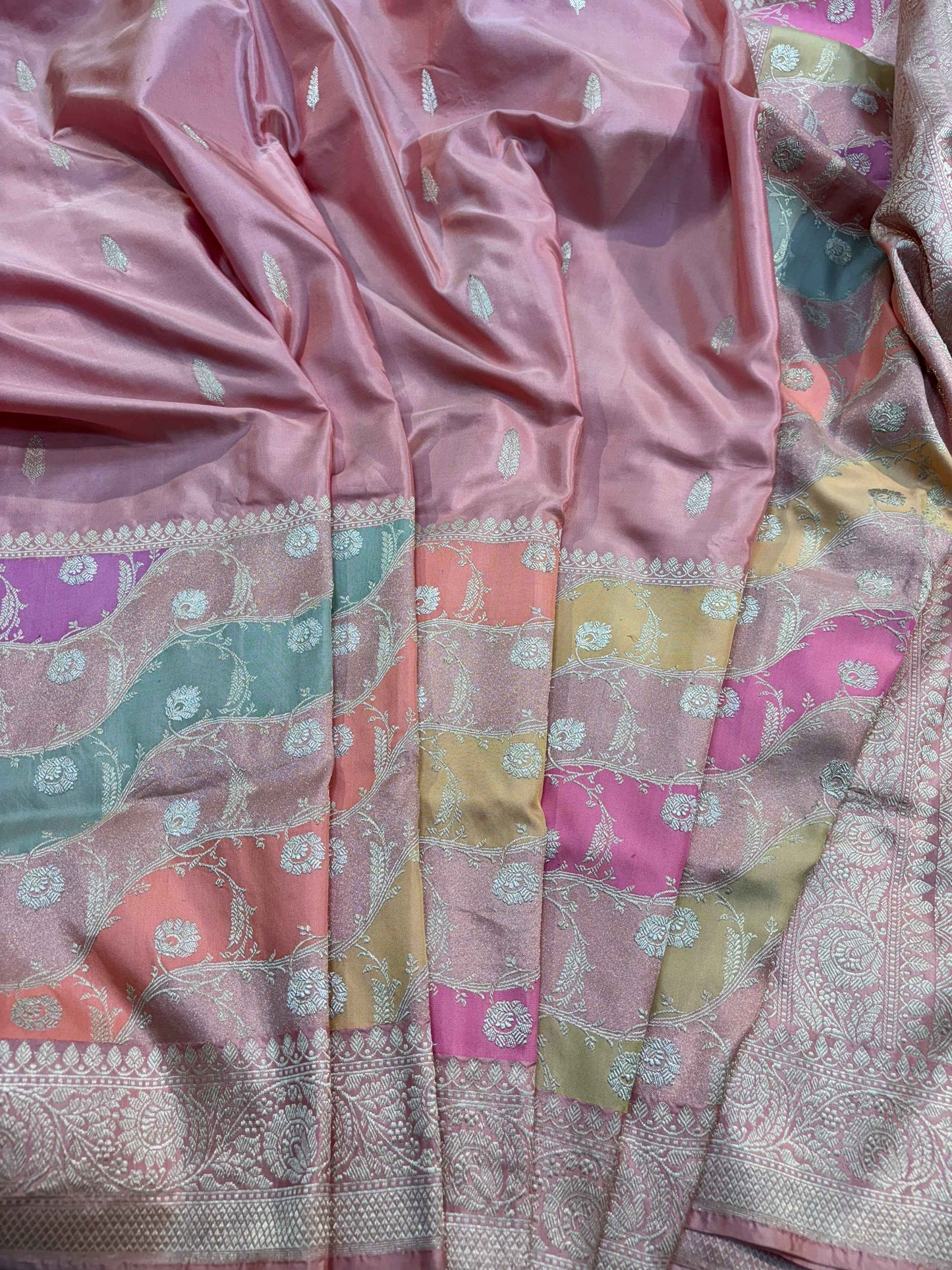 Light pink Banarasi silk saree with multicolor strip work and silver woven patterns