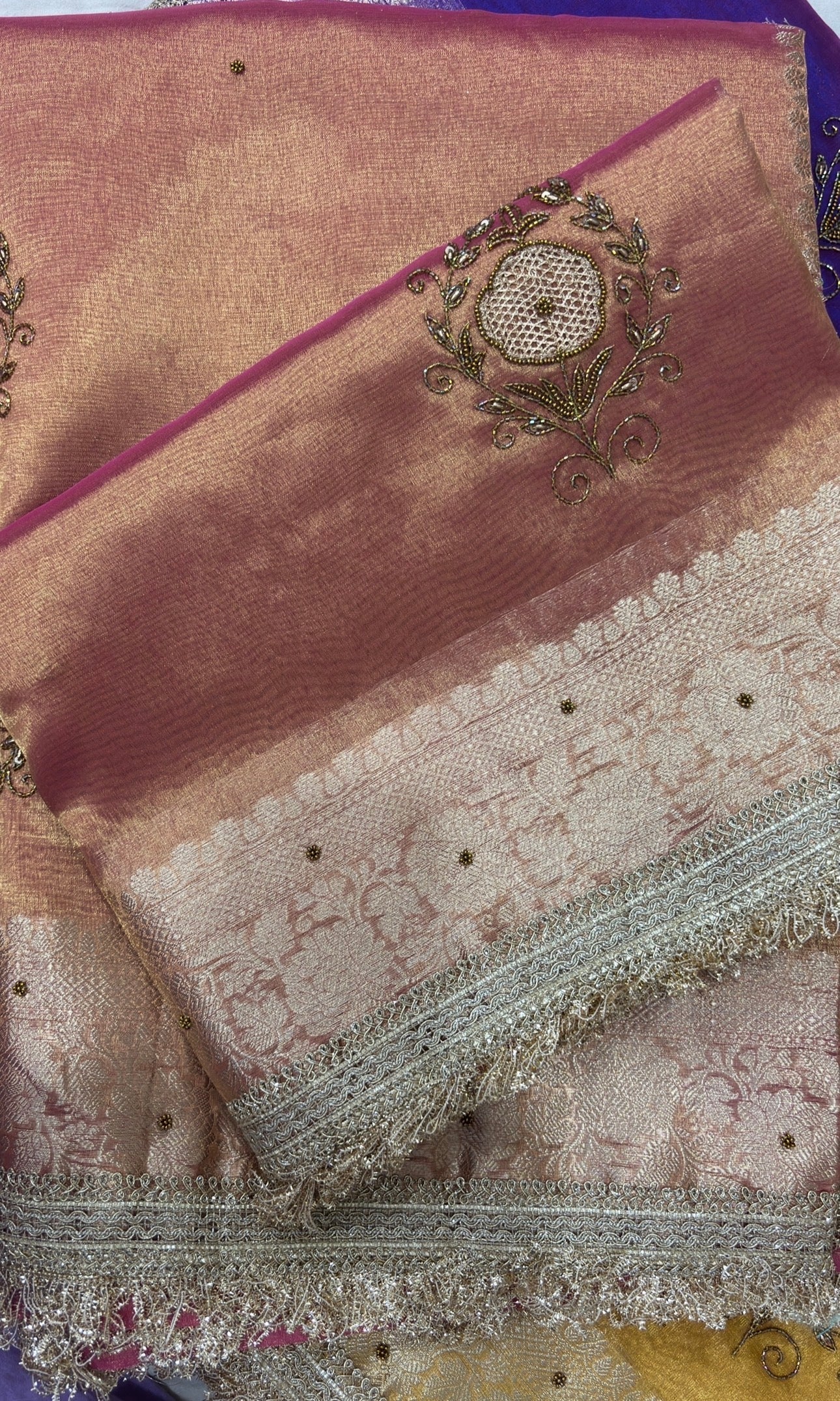 Peachpink Banarasi sari with zardoji floral lace border and embellished pallu panel