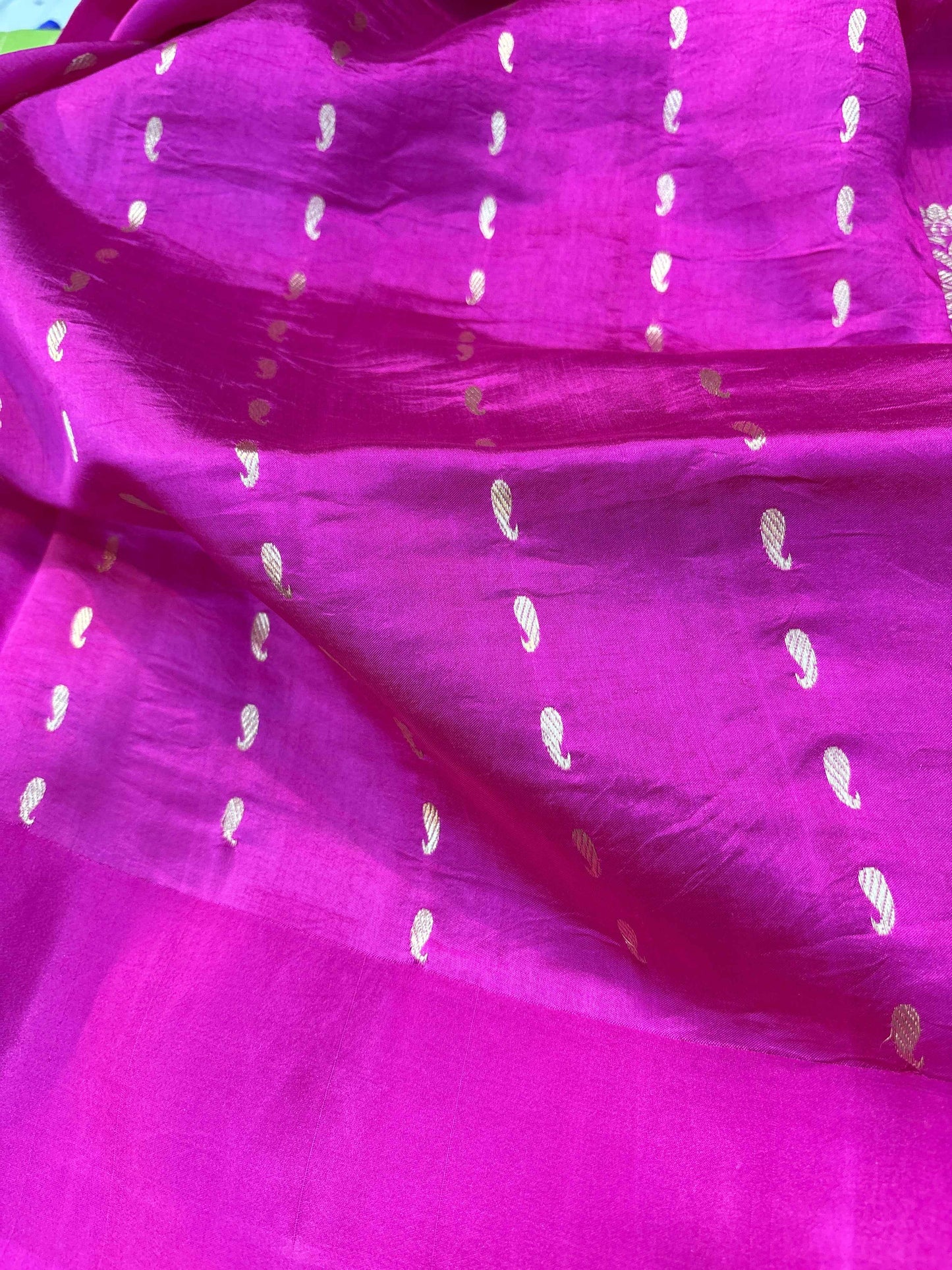 Purple raw silk saree with small gold teardrop motifs and fine woven sheen