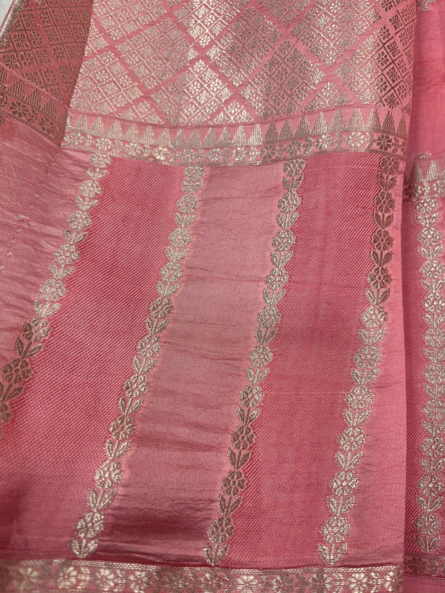 Peach-pink saree with silver patterned panels and diamond lattice detailing