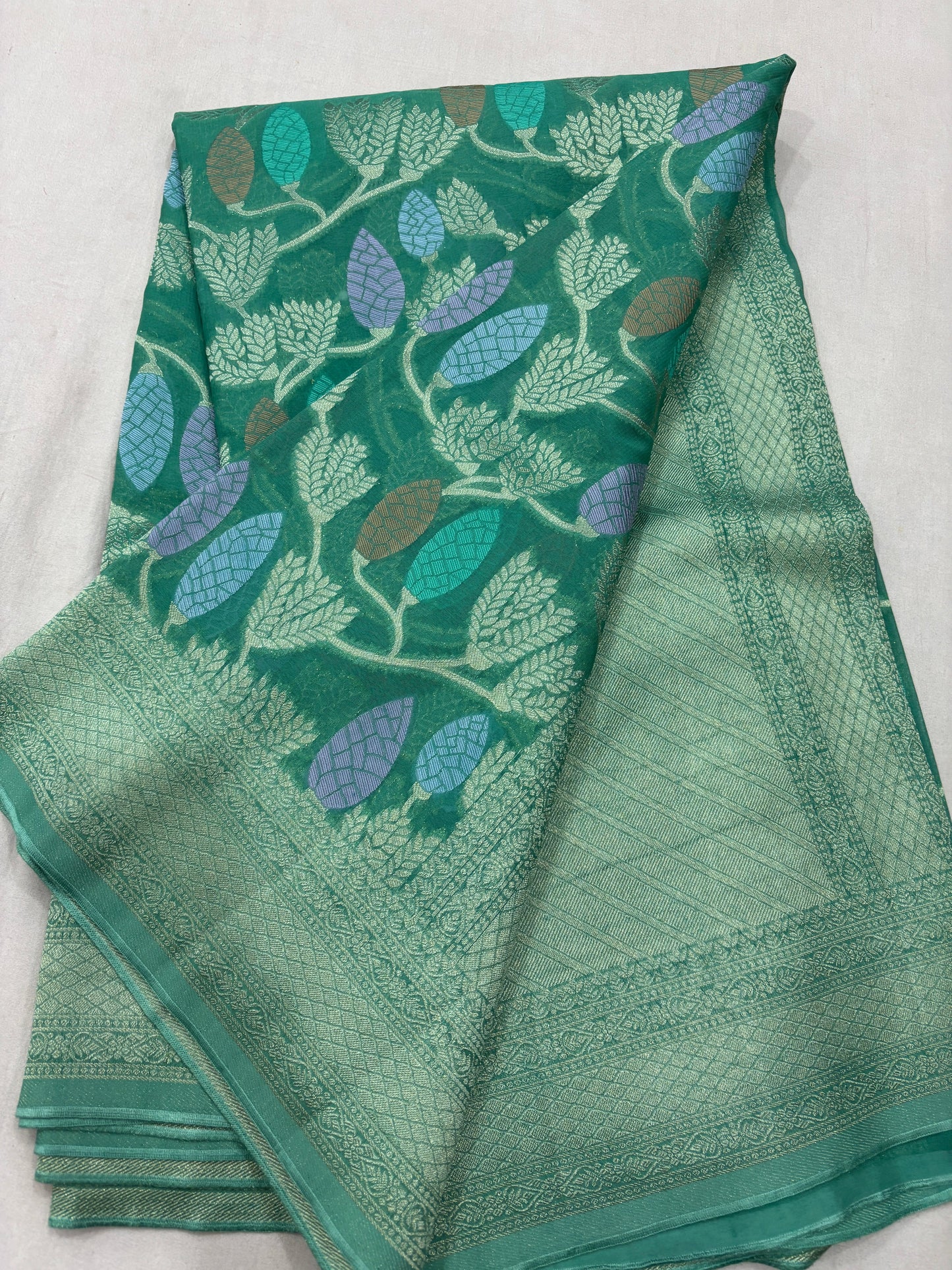 Sea Blue Semi Khaddi Georgette Banaras Sariย