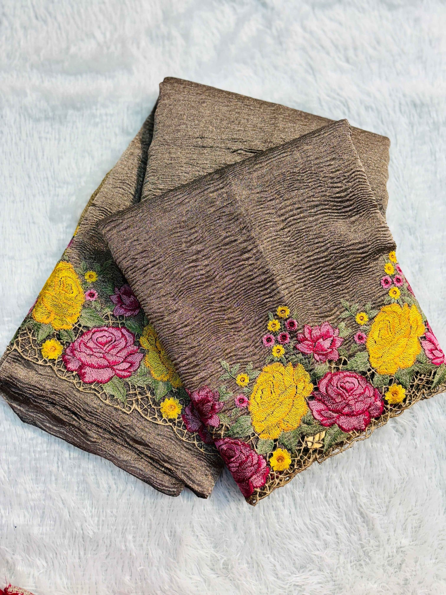 Banarasi handloom saree in brown with multicolor floral embroidery and net lace border.