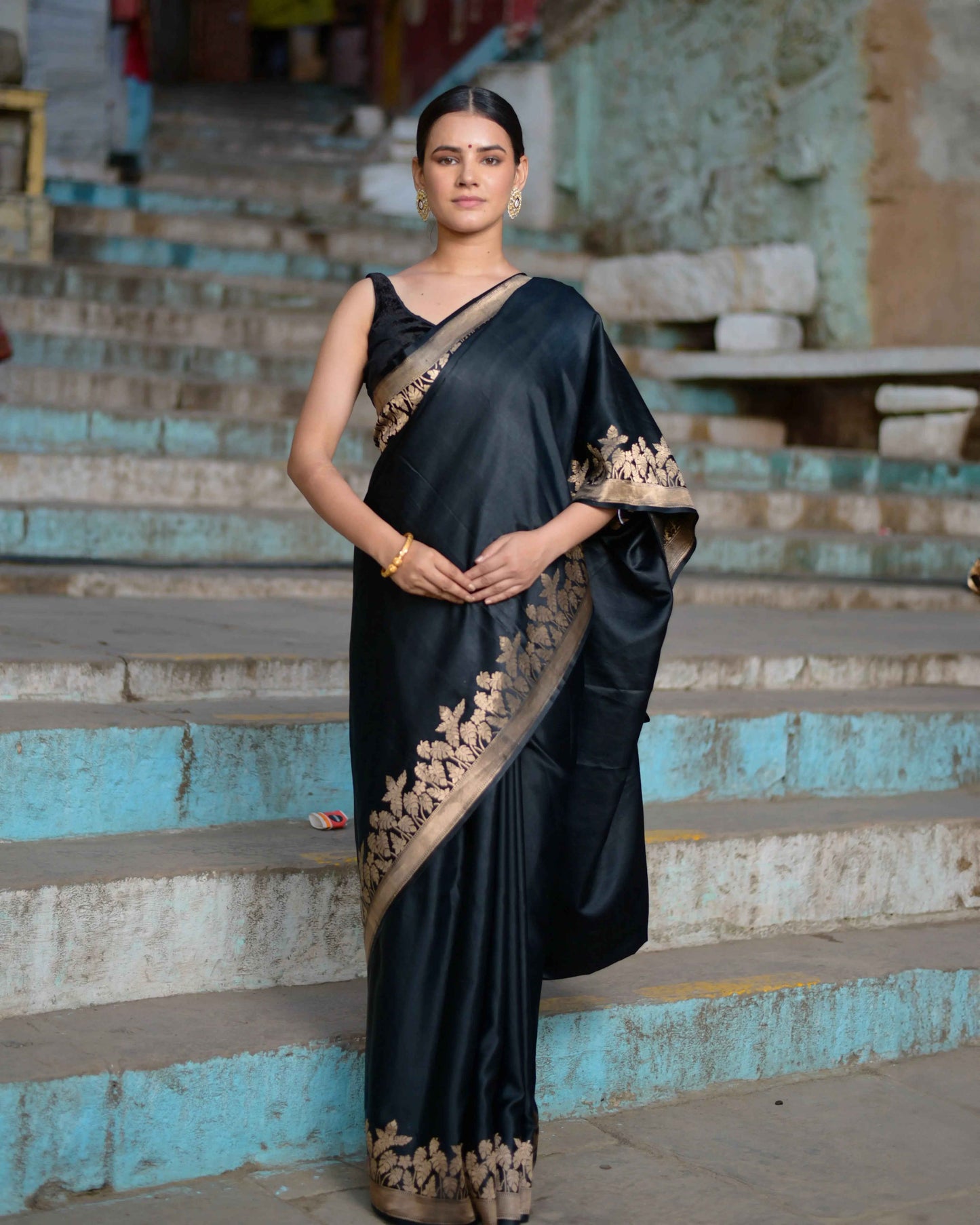 Black plain mashru saree with gold-toned woven border and pallu detail