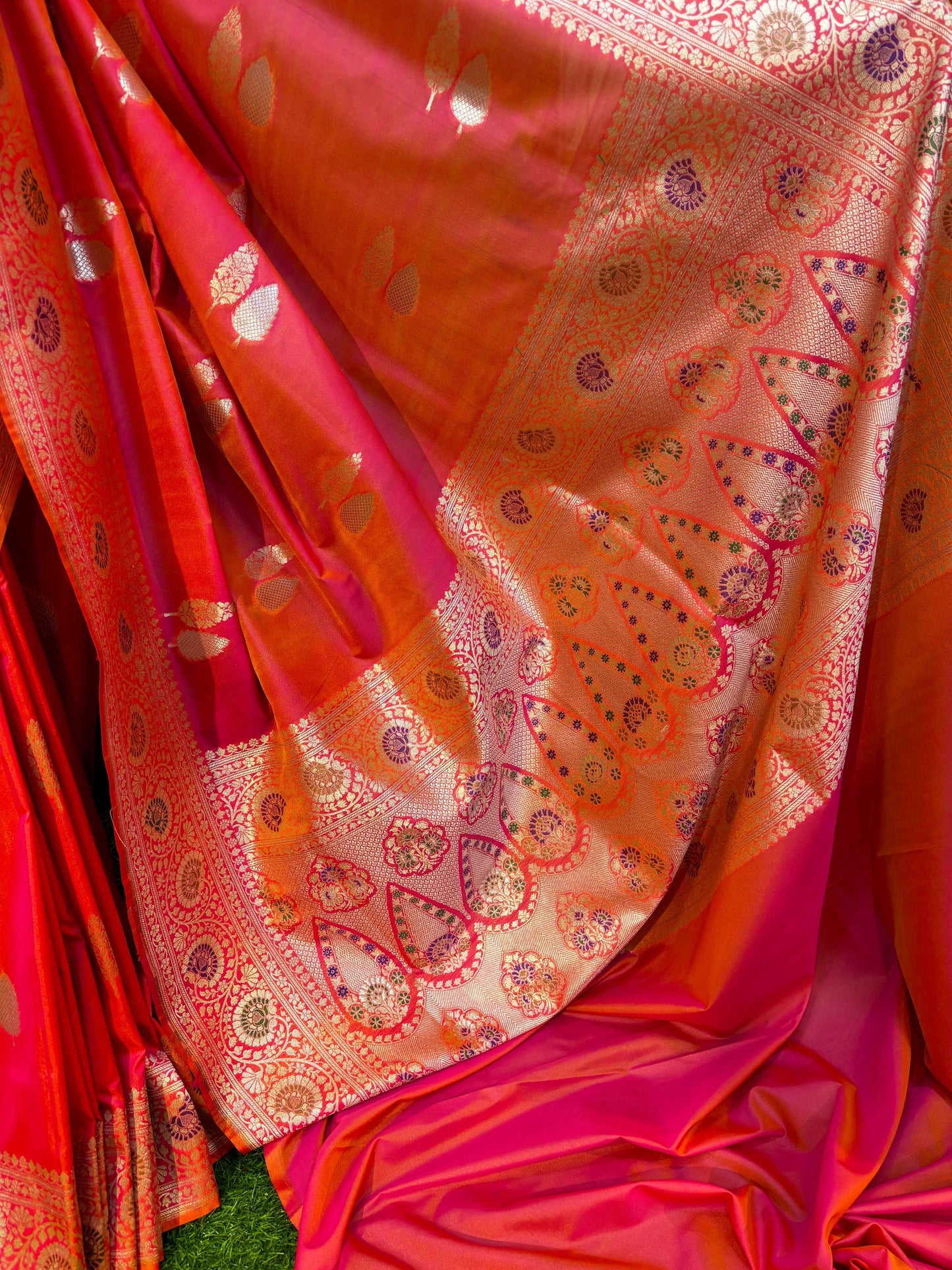Orange and pink saree fabric with gold zari leaf buta, dotted motifs, and pallu panel