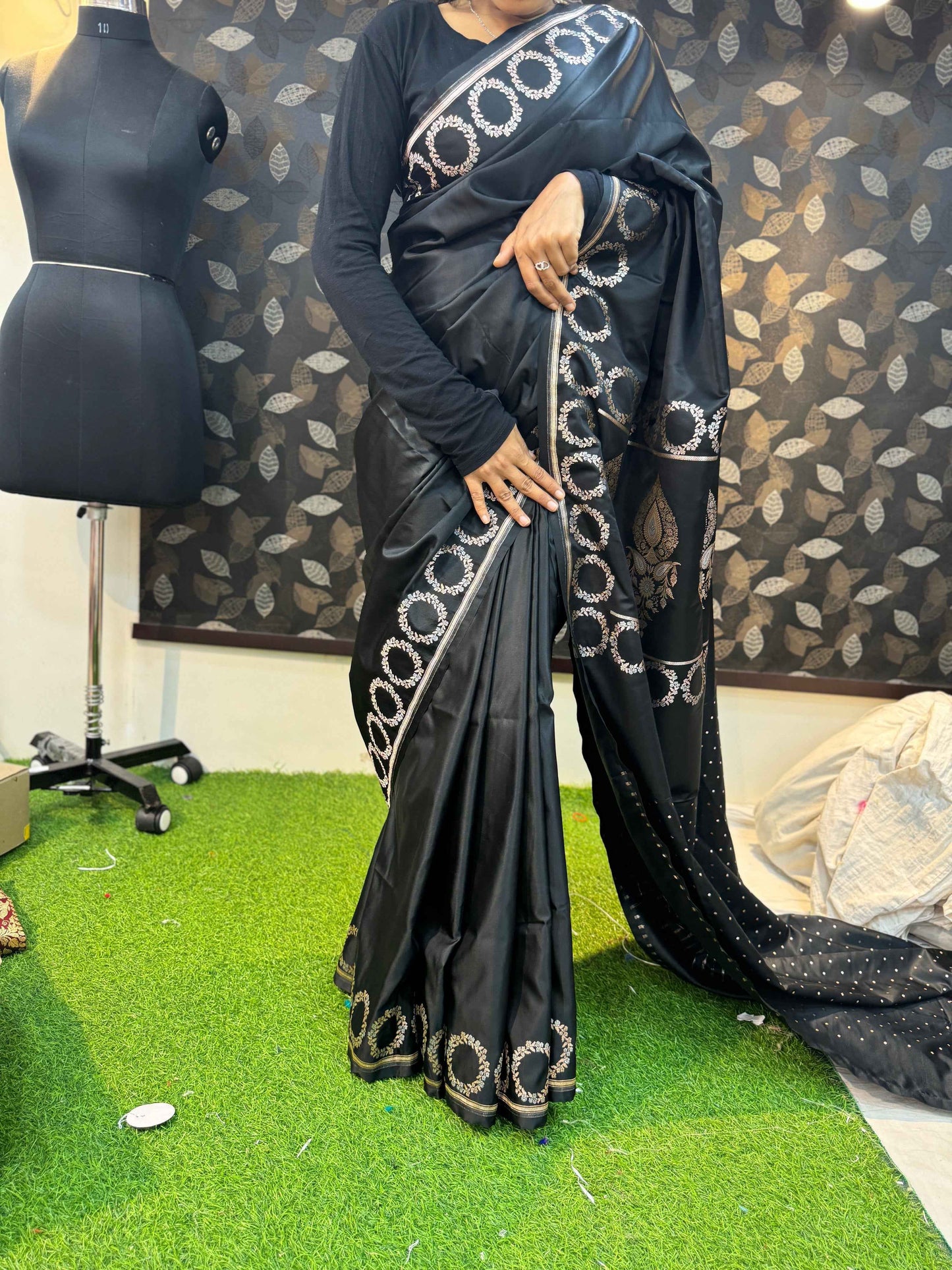 Black Banarasi silk sari with ornate circular border and gold motifs