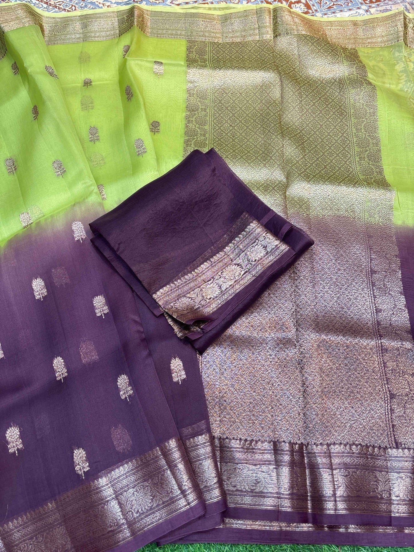 Lime green and purple silk saree with gold motifs and silver zari border