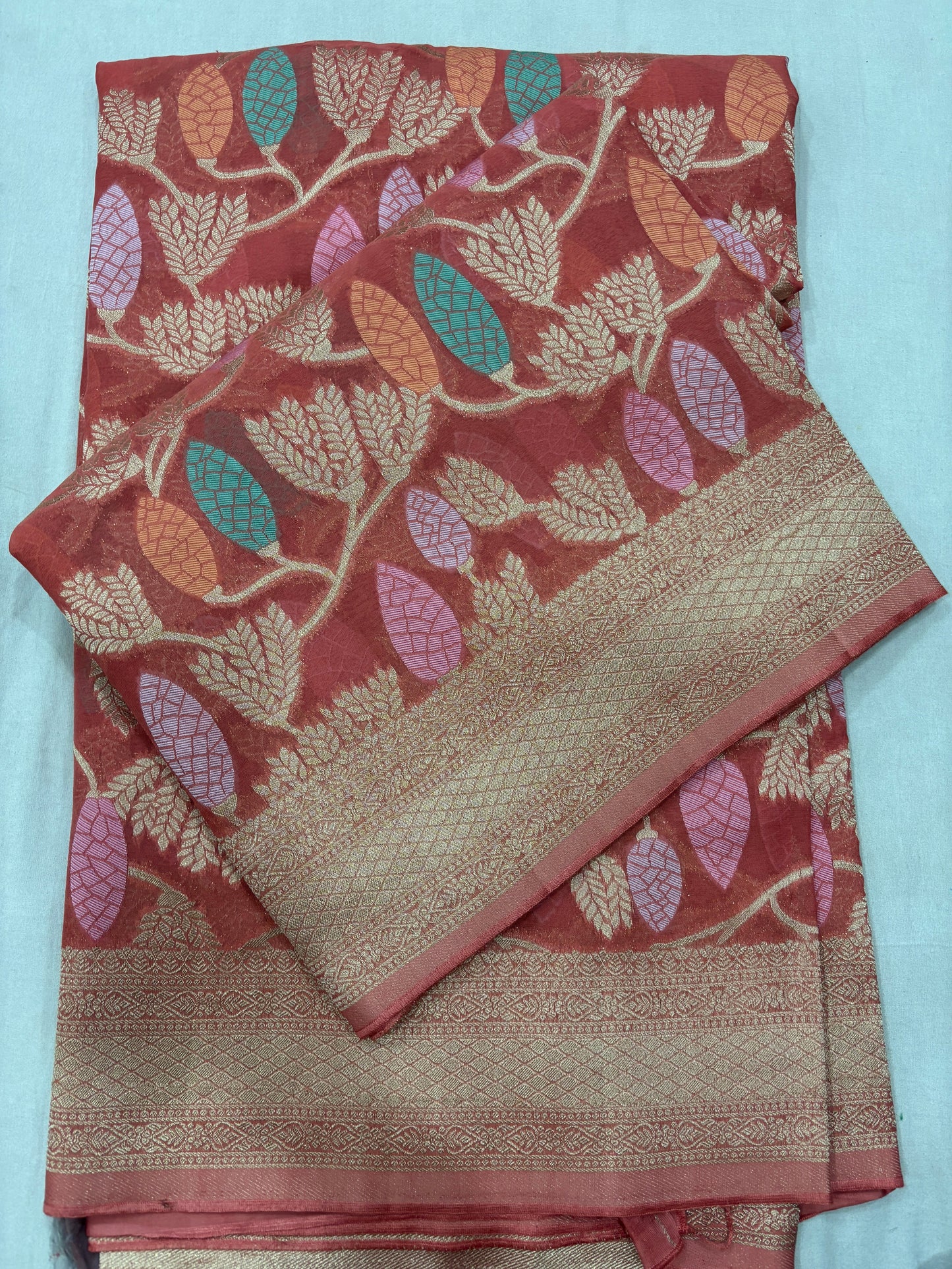 Carrot Pink Semi Khaddi Georgette Banaras Sariย
