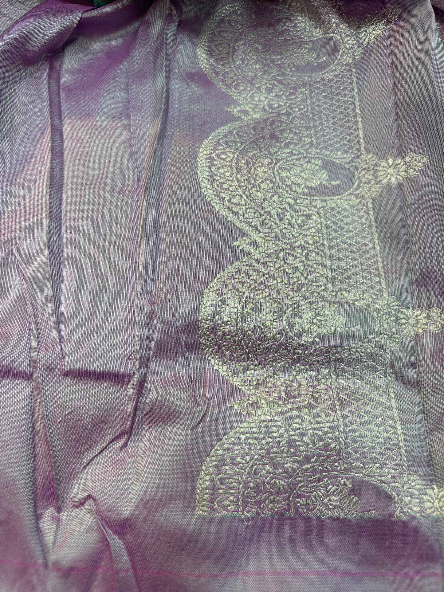 Lavender saree panel with gold-toned motif design and fine woven texture