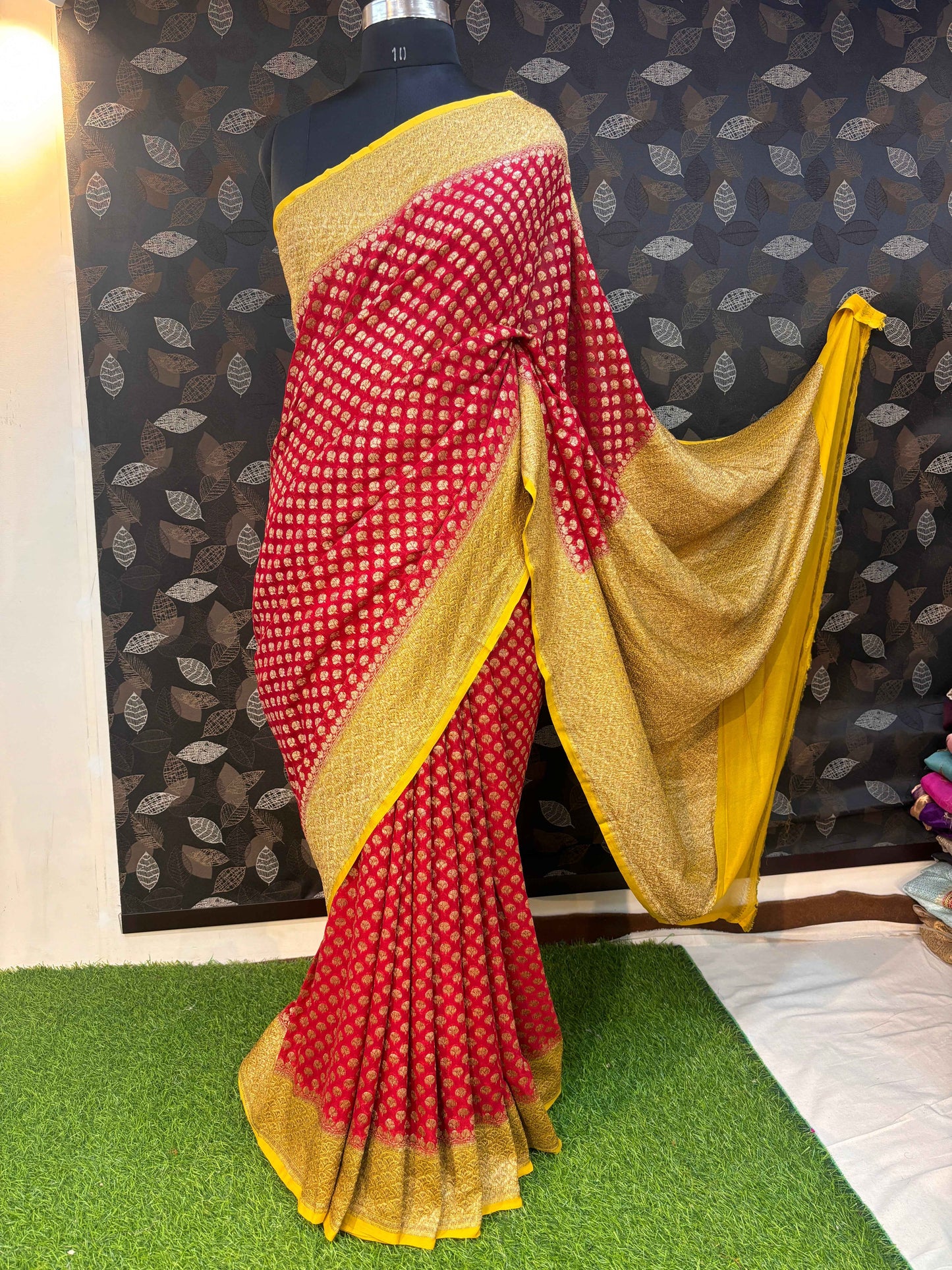 Red and gold chiffon Banarasi saree with patterned body, yellow pallu, long border drape