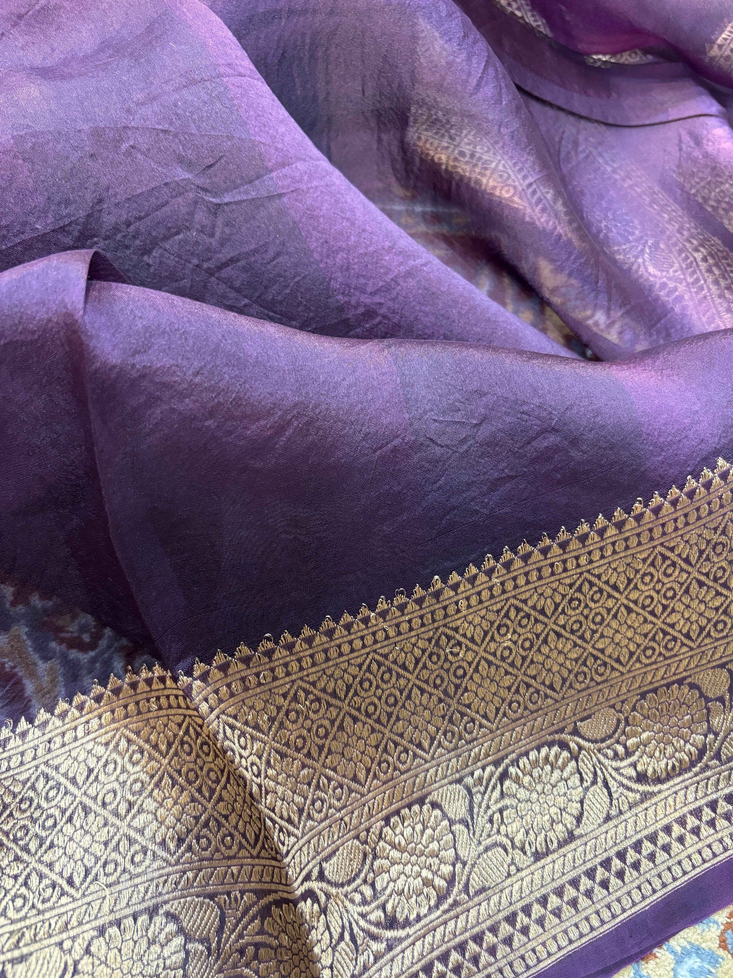 Purple Banarasi handloom saree pleats with gold zari woven edge
