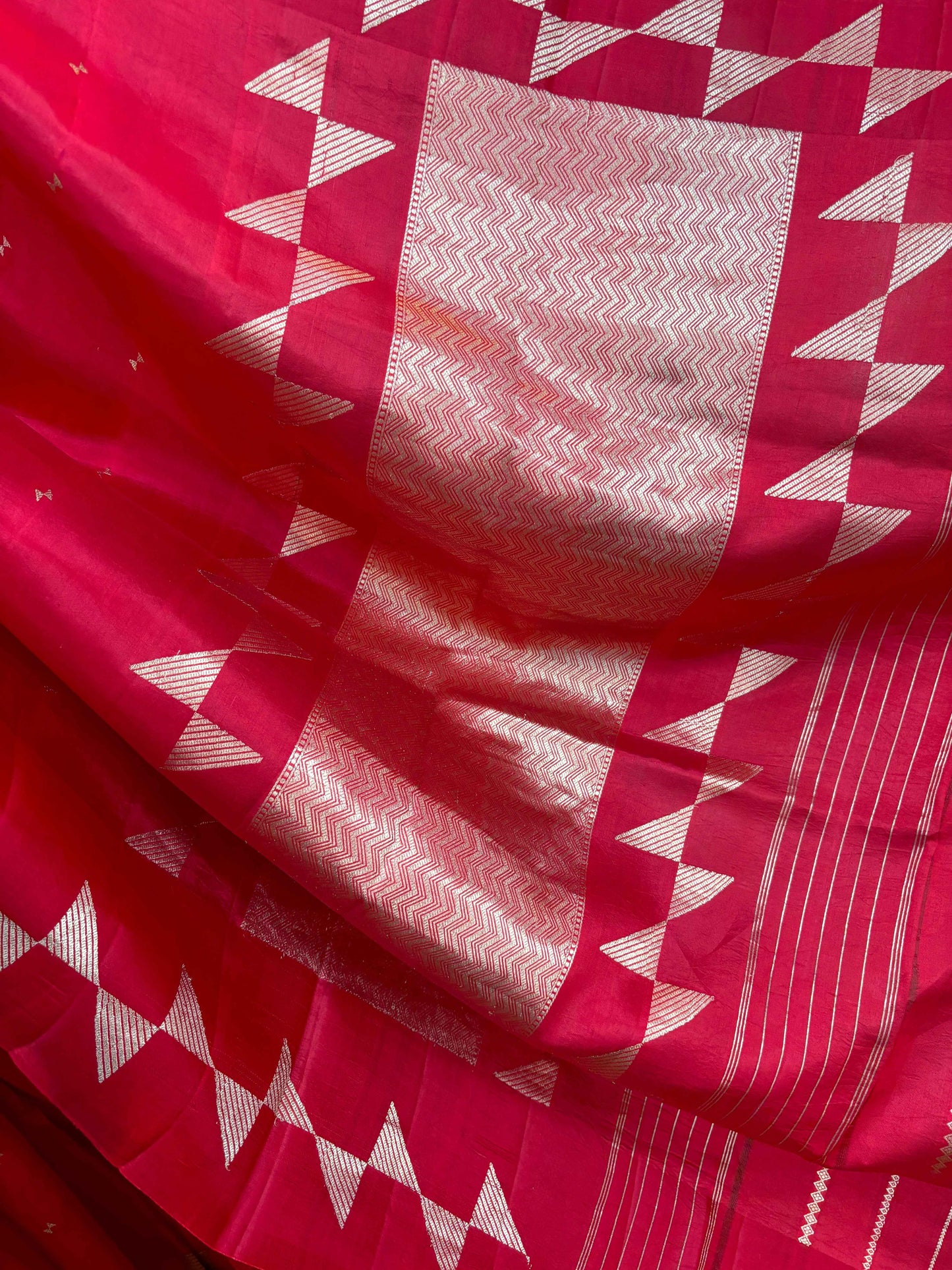 Red Banarasi handloom saree with textured pallu panel and white zigzag diamond accents