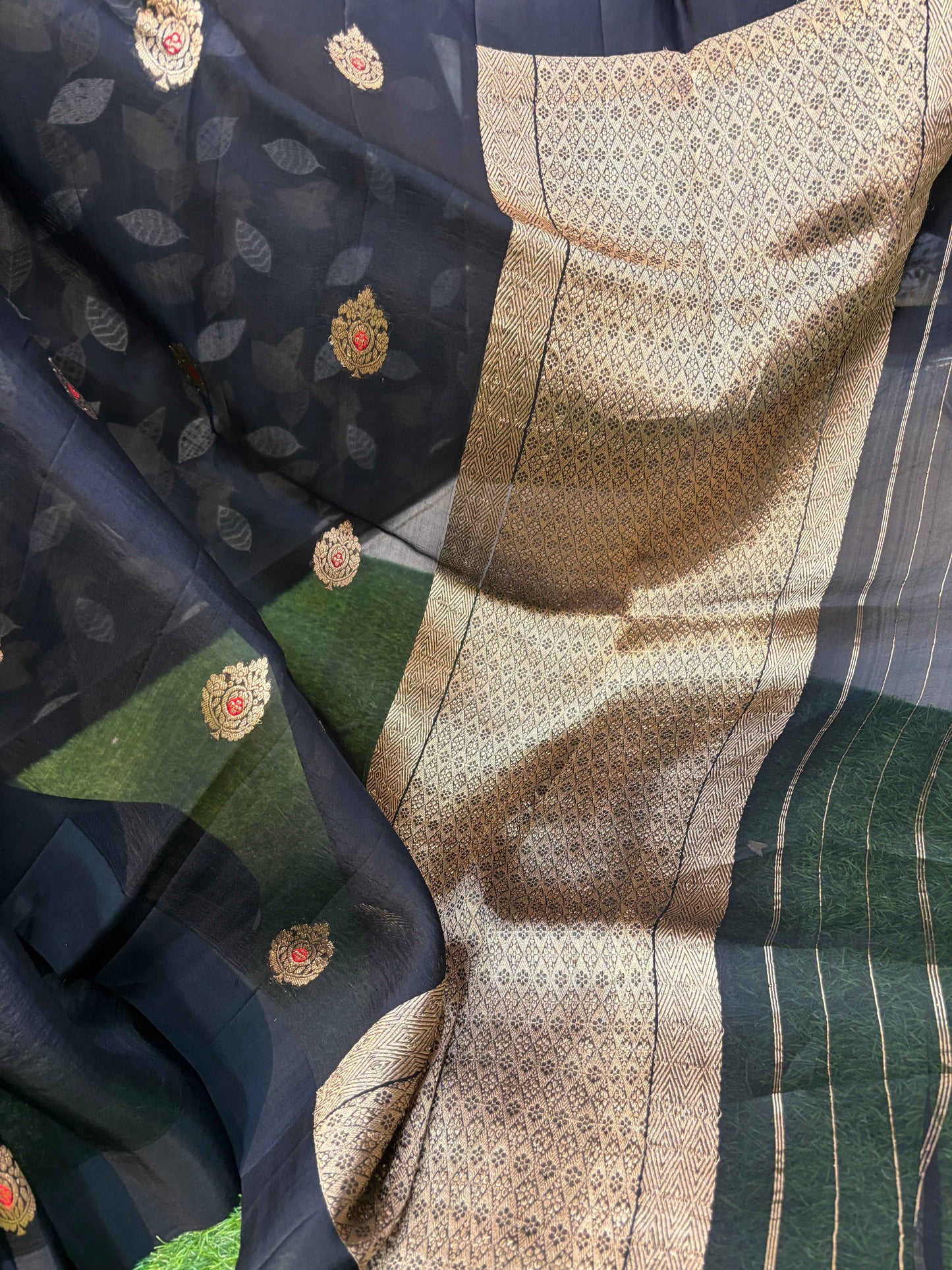 Black handloom saree fabric with gold pallu border and woven motifs