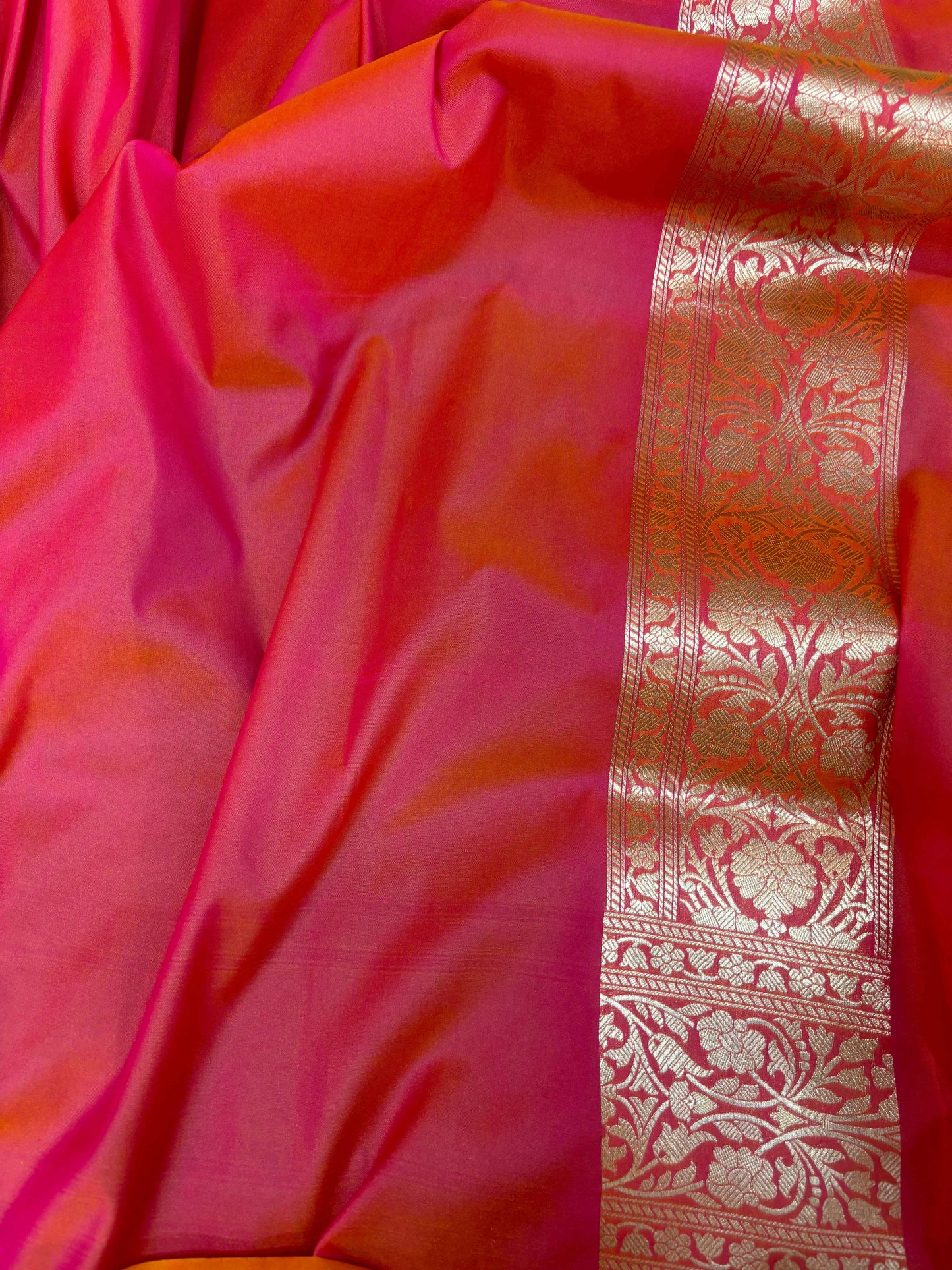 Pink silk saree fabric with gold zari woven border and floral damask motifs