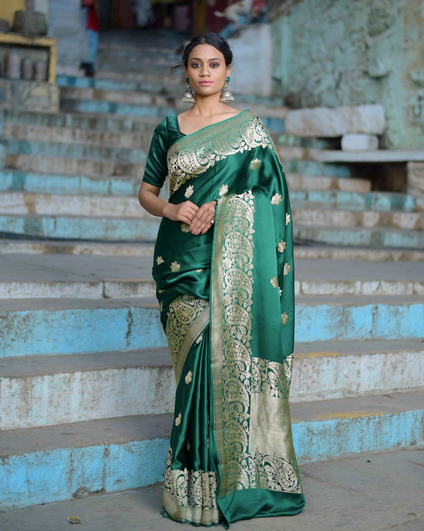 Green and gold handwoven saree with allover boota and ornate border