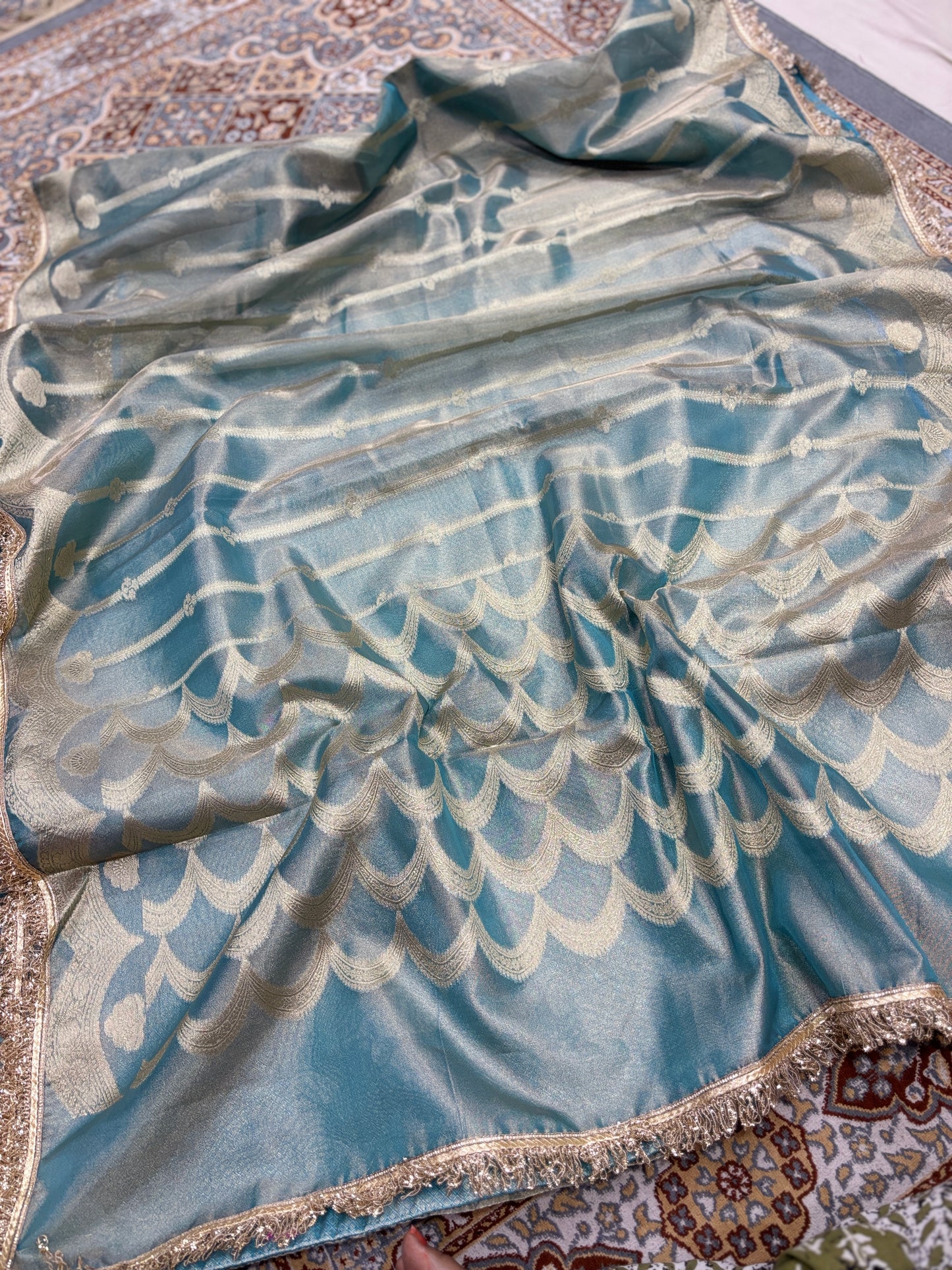 Blue tissue saree with silver scalloped motifs and metallic lace-trim border