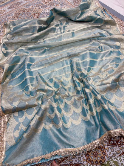 Blue tissue saree with silver scalloped motifs and metallic lace-trim border