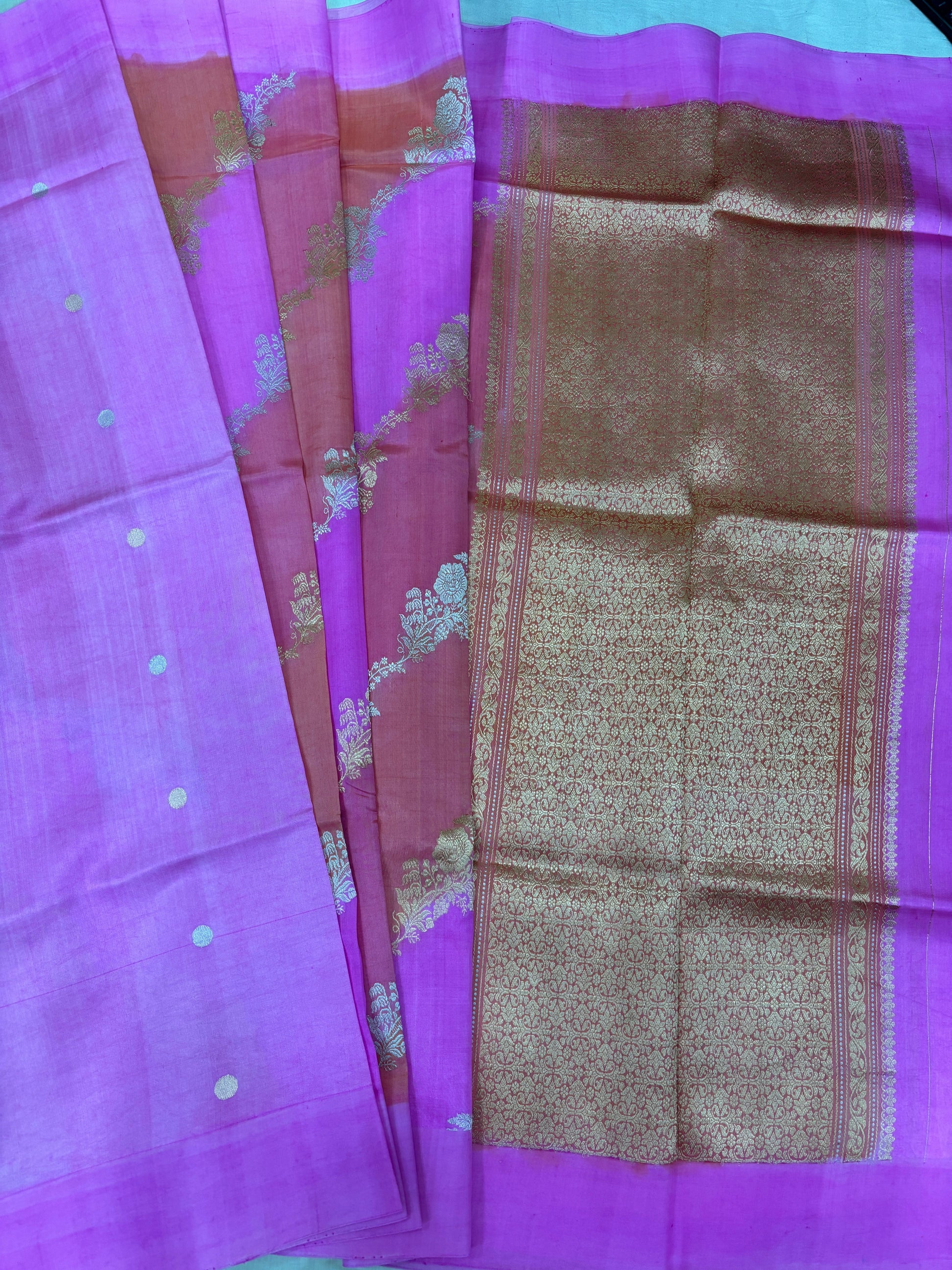 Purple silk saree with gold floral vine motifs and patterned pallu