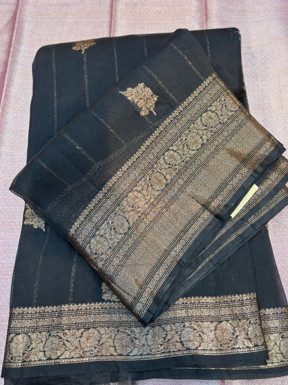 Dark silk saree with gold zari woven borders and folded pallu