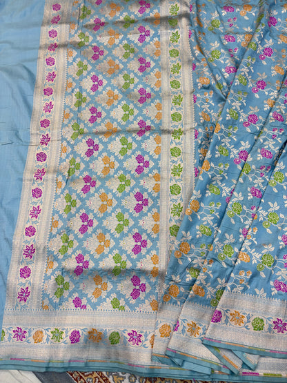 Powder blue Katan silk saree with multicolor flower grid pattern and blue border