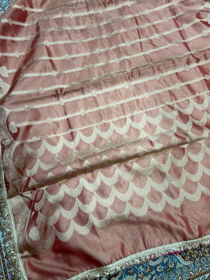 Rose-pink tissue saree with white scalloped motifs and metallic lace border