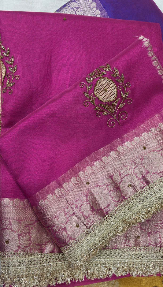 Pink Banarasi sari with tissue weave and gold zardozi-style circular lace motif; ornate border