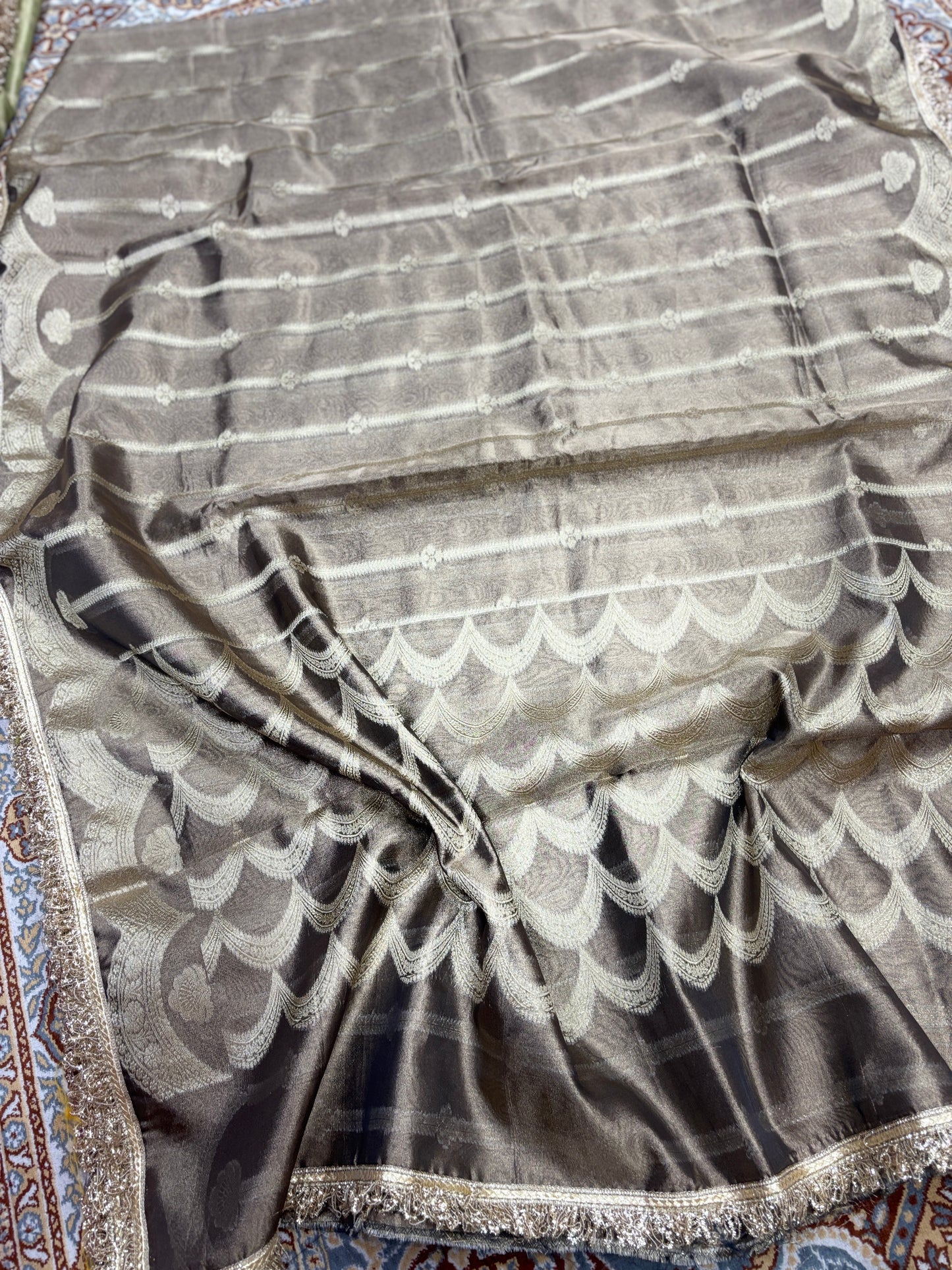 Grey tissue saree with silver scalloped pattern and metallic lace-trim border