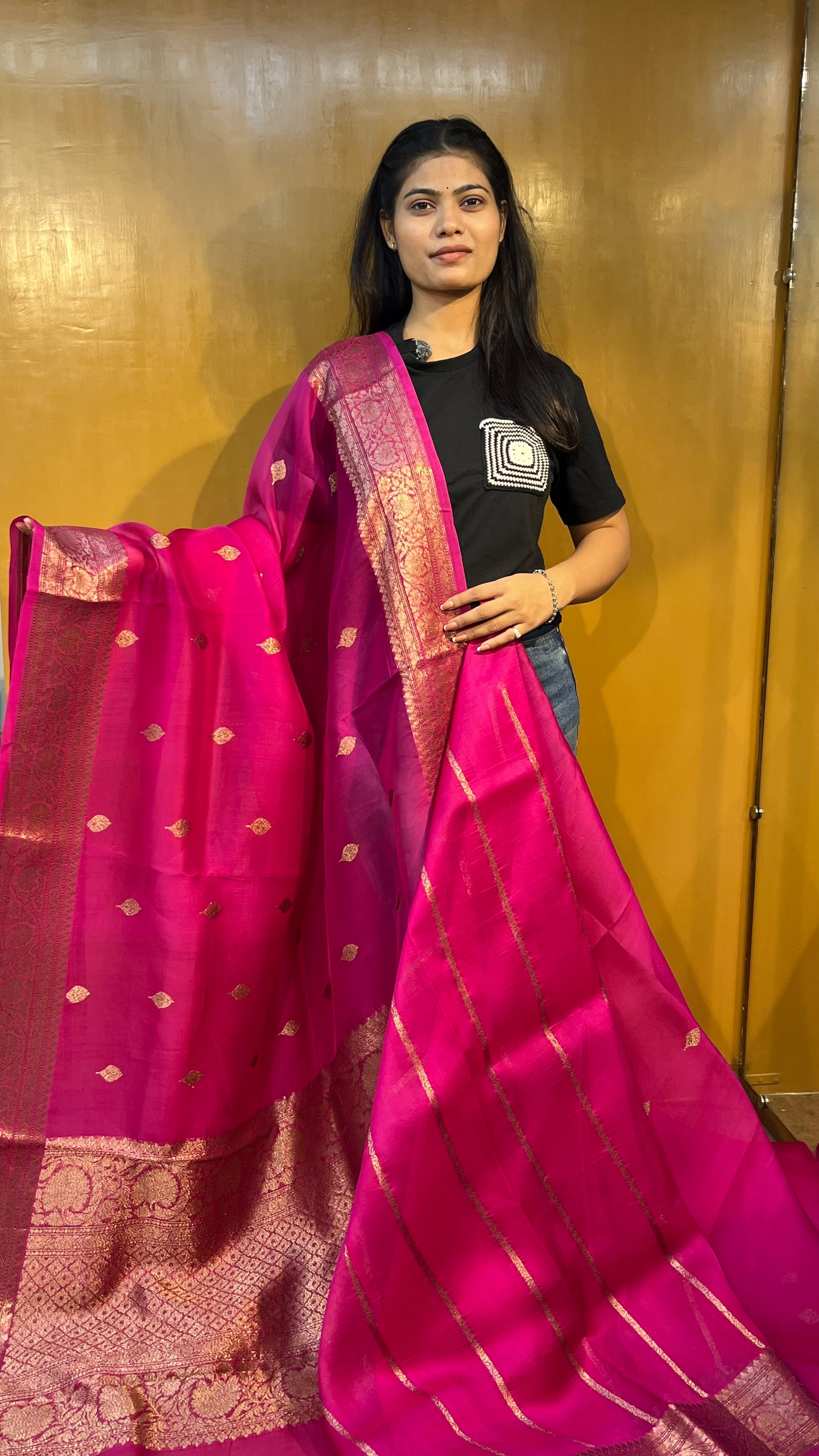 Magenta Banarasi saree with gold zari pallu, dotted motifs, and wide woven border