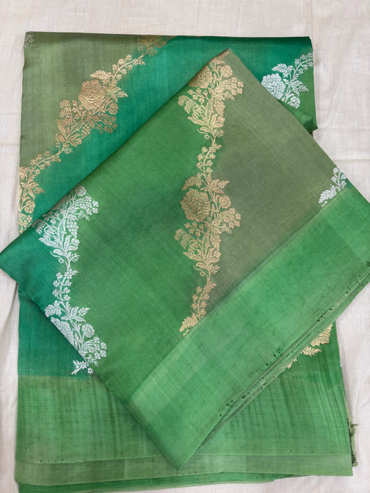 Green Banarasi handloom saree with gold and white floral motifs and contrast border