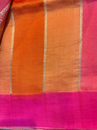 Orange-pink saree with silver vertical stripes and magenta border