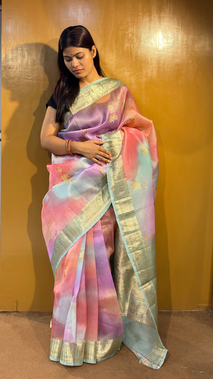 Pastel pink and blue saree with gold border and floral motifs