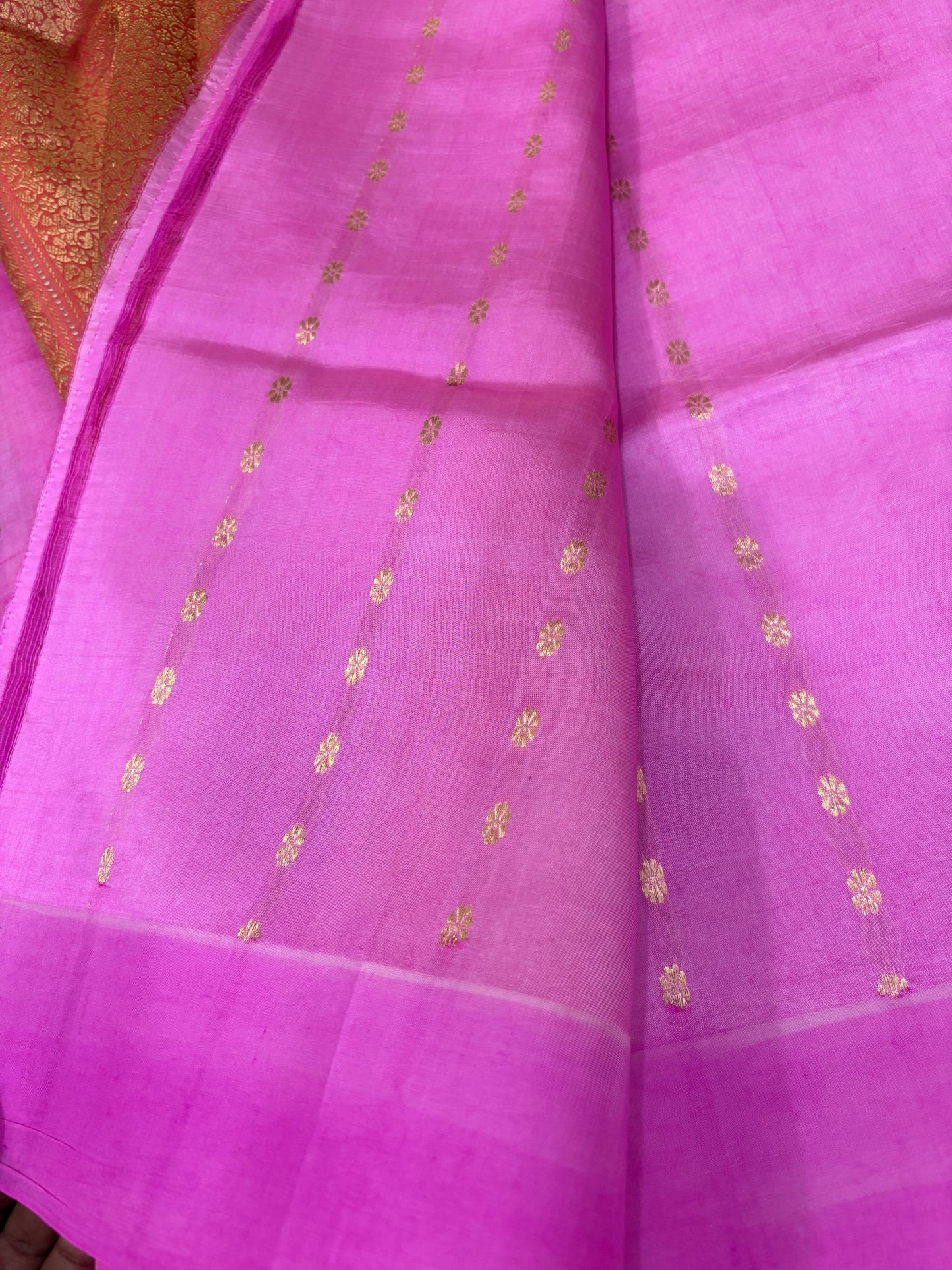 Pink silk saree with gold dotted motifs and woven border