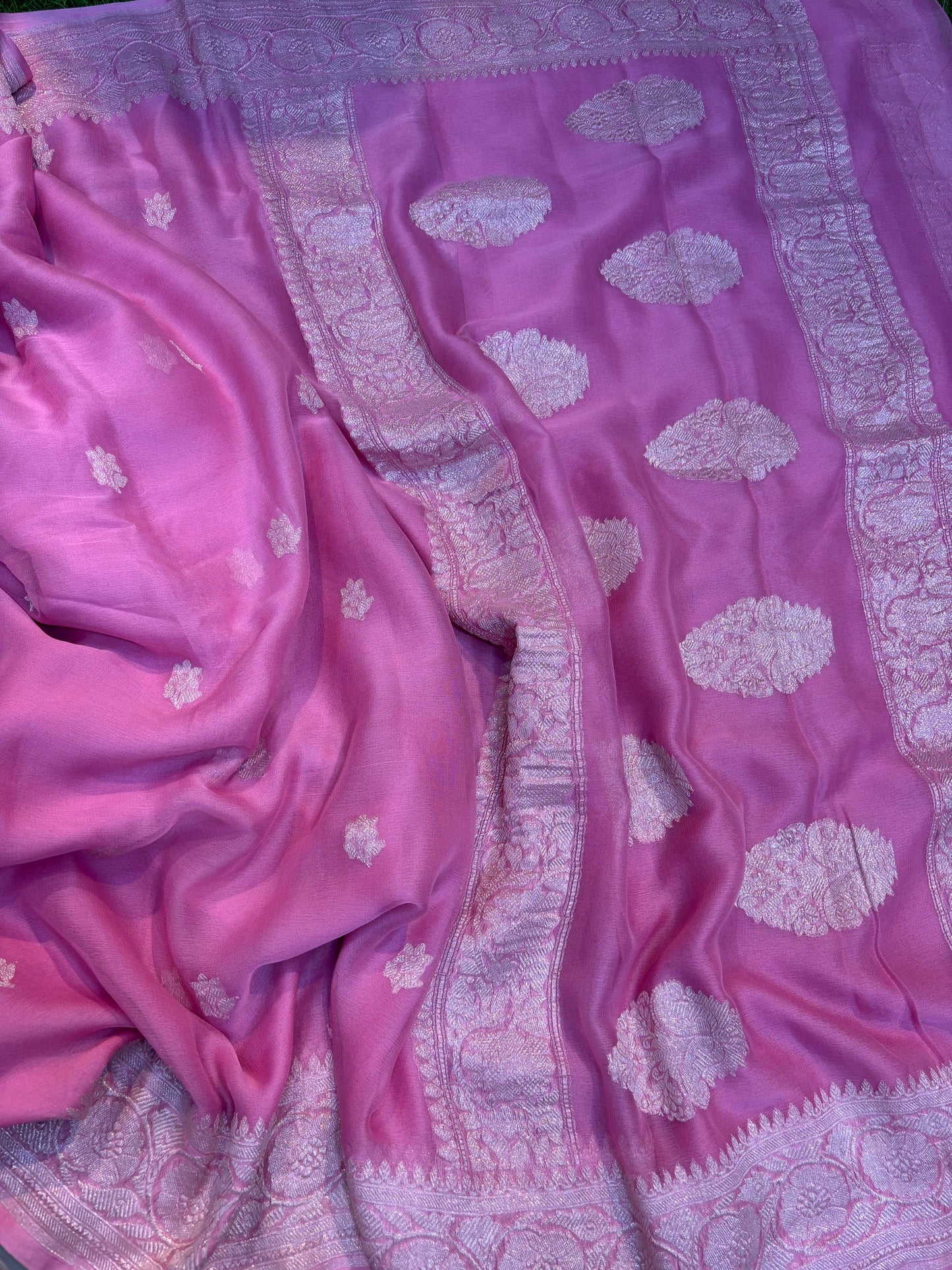 Pink chiffon saree with silver zari buta motifs and textured border panel