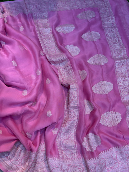 Pink chiffon saree with silver zari buta motifs and textured border panel