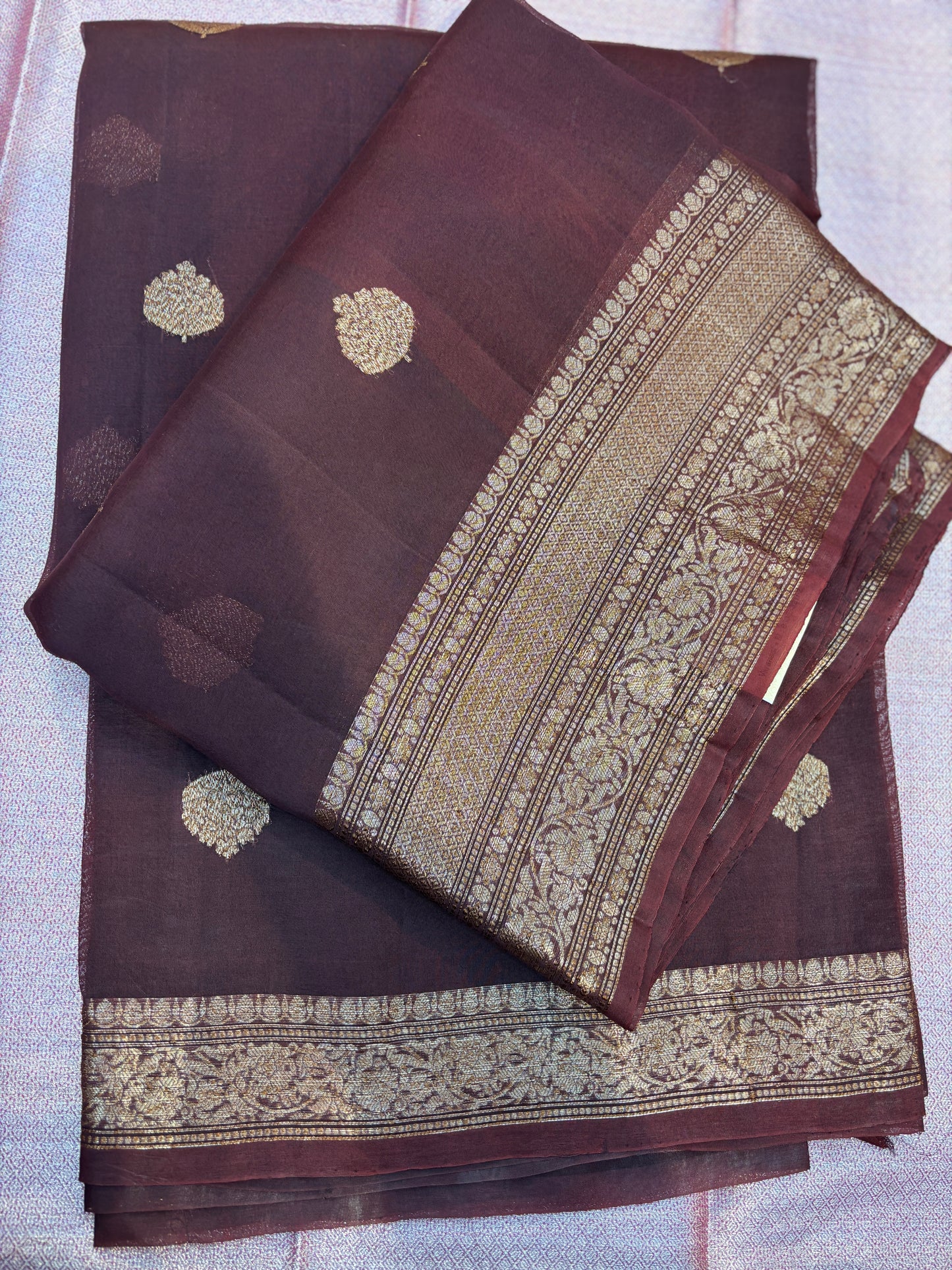 Plum silk saree with gold zari border and repeating dot motif pattern