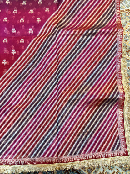 Purple and maroon striped Banarasi handloom saree with gold and patterned border