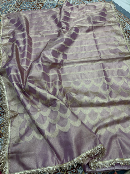 Lavender tissue saree with silver scalloped motif and ornate lace border