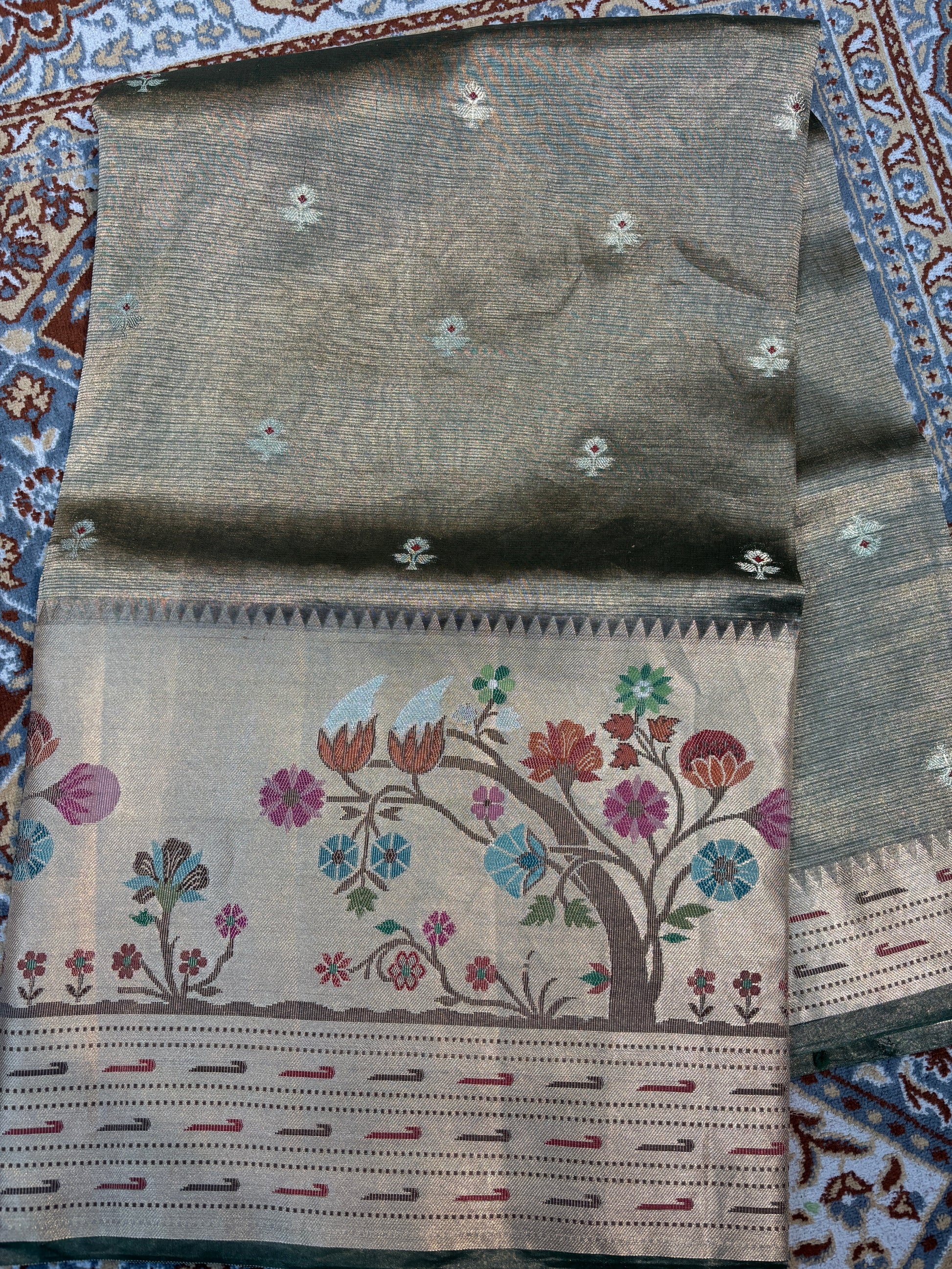 Grey saree with floral pallu border, multicolor vines and dotted trims