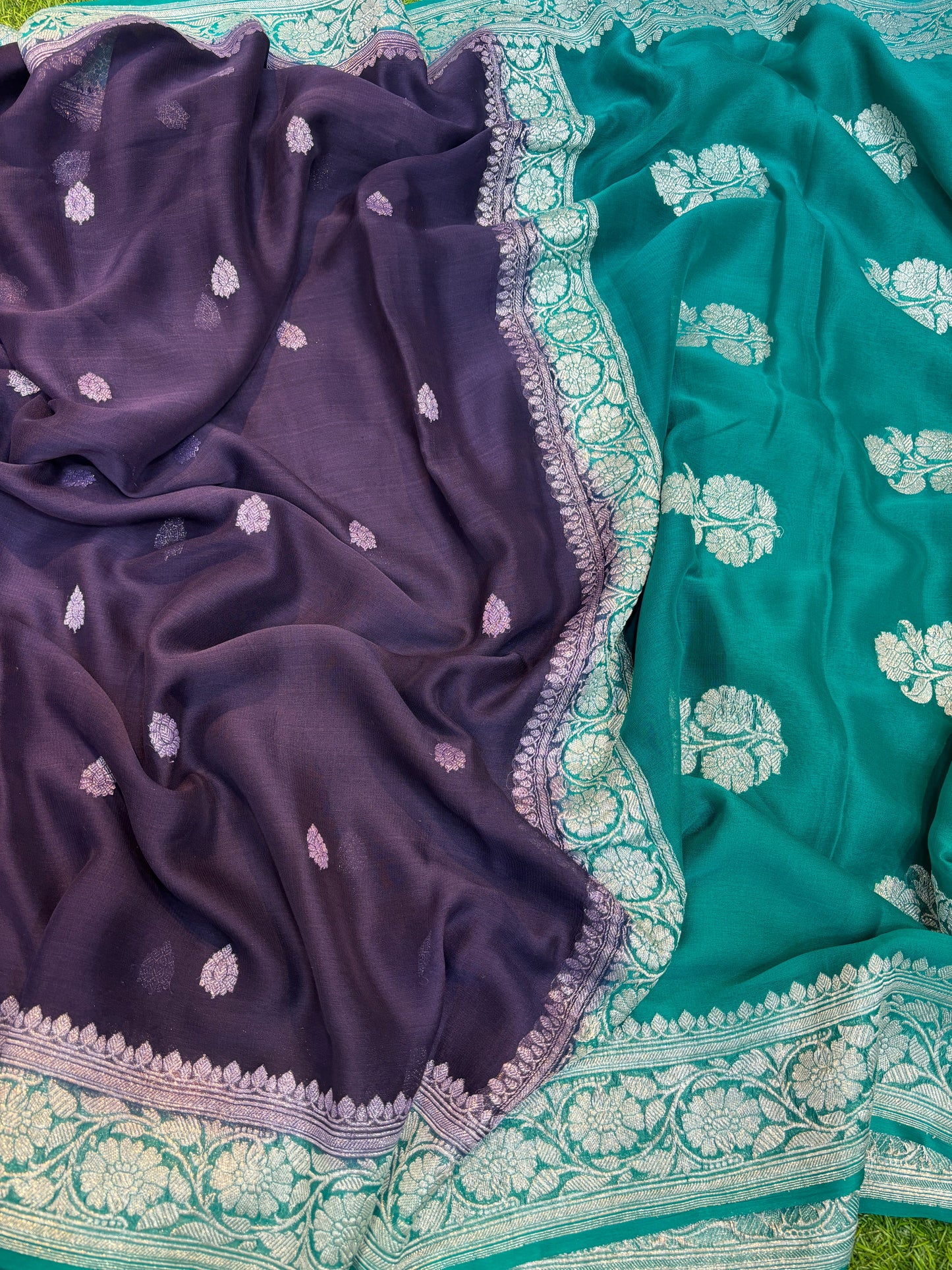 Dark purple and teal chiffon saree with gold-toned border and small silver motifs