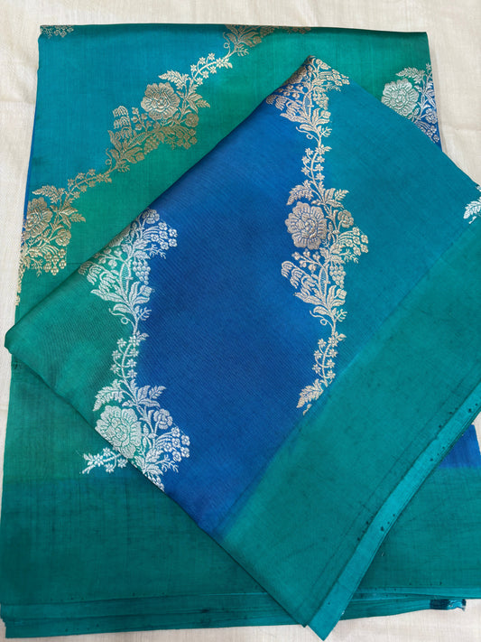 Teal sari with gold floral motifs and contrast blue border
