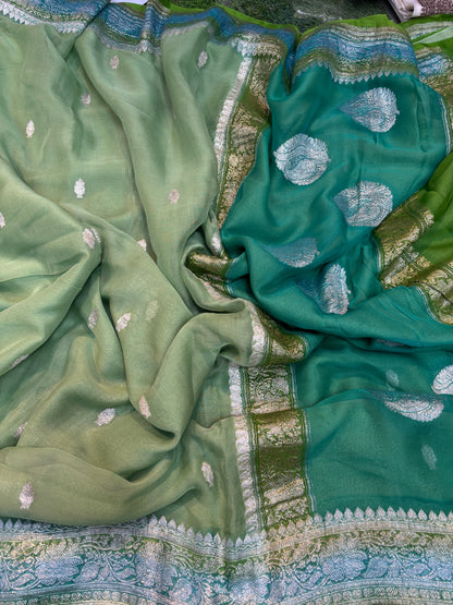 Light green and teal chiffon saree with silver motifs and contrasting zari-style border