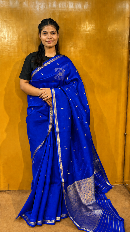 Blue Banarasi handloom saree with gold zari border and small metallic motifs