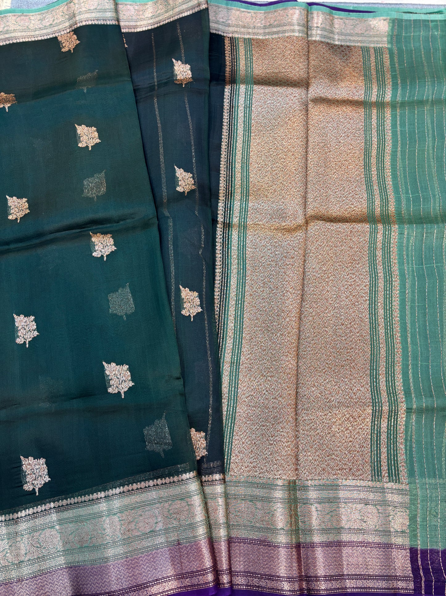 Teal and beige handloom saree with gold motif checks and woven green border